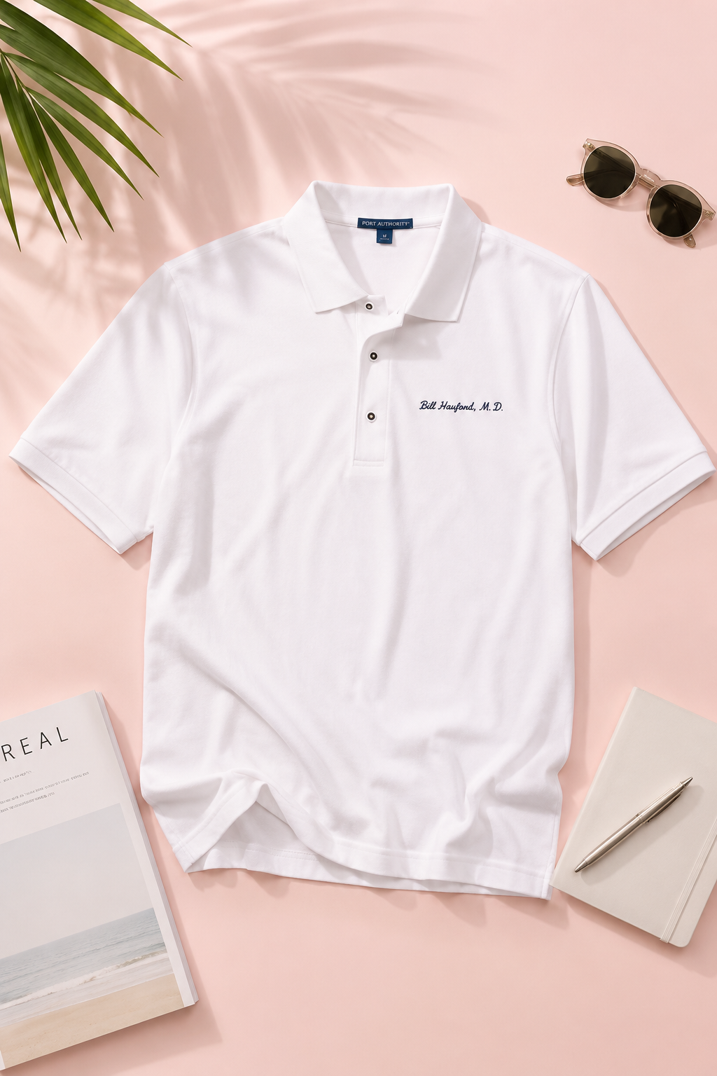 Front view of Bill Hayford M.D. embroidered doctor polo shirt worn by female model