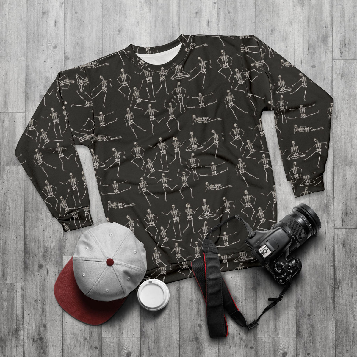 Black Dancing Skeletons Sweatshirt styled flat lay with casual streetwear accessories