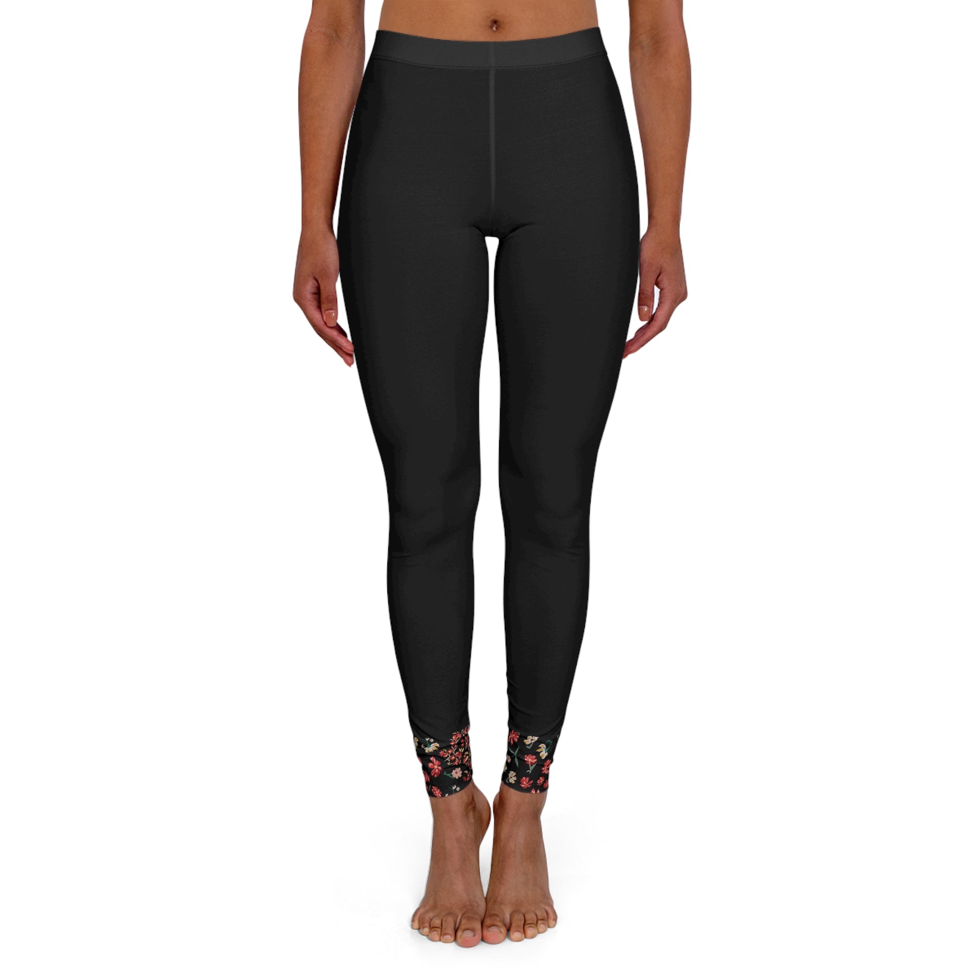 Front view of black high waist leggings with floral ankle detail and soft stretch activewear fit.