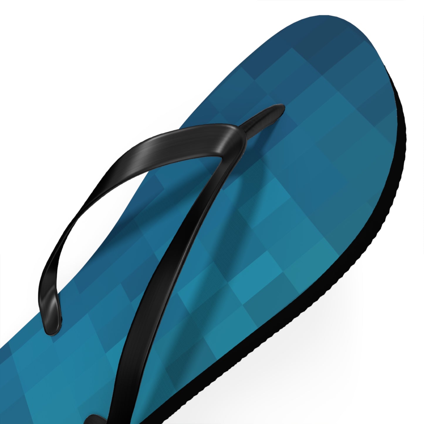 Close-up detail of blue pixel gradient flip flops inspired by retro gaming aesthetics