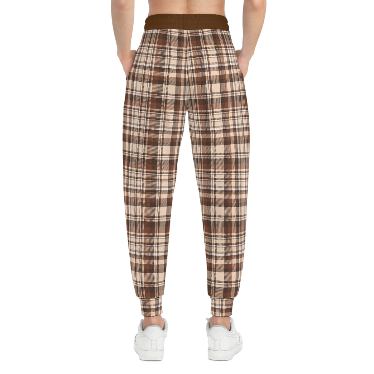 Women's brown plaid joggers front view with tapered legs and comfortable stretch fit