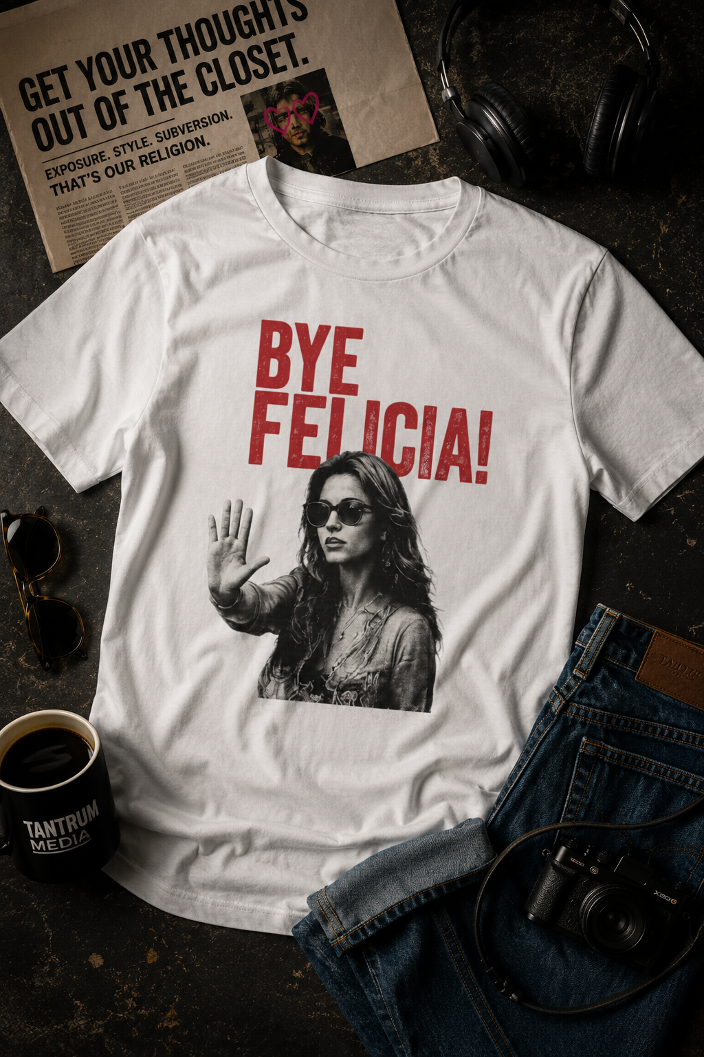 White Bye Felicia graphic t-shirt editorial flat lay mockup with denim and accessories