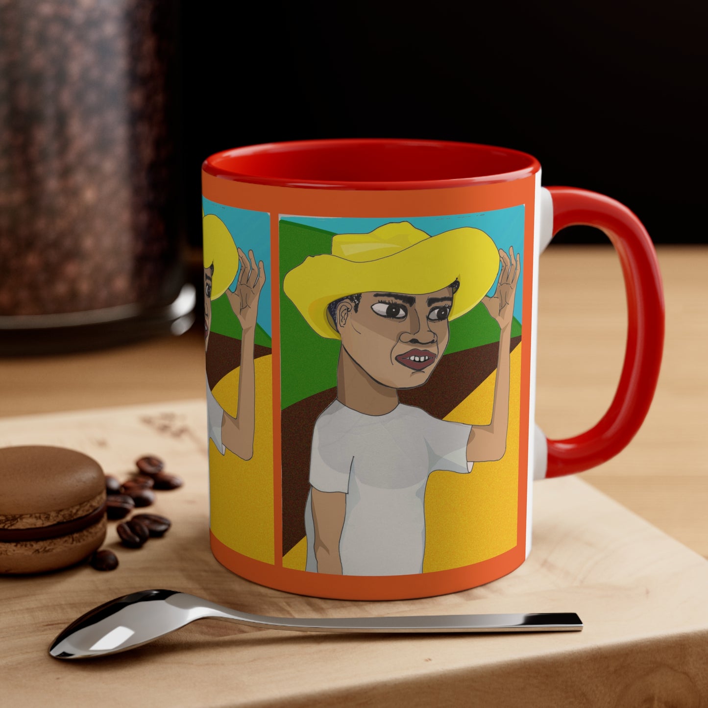 11oz Cafetero Coffee Mug featuring colorful illustrated artwork, red interior, and red handle on a coffee table setting.