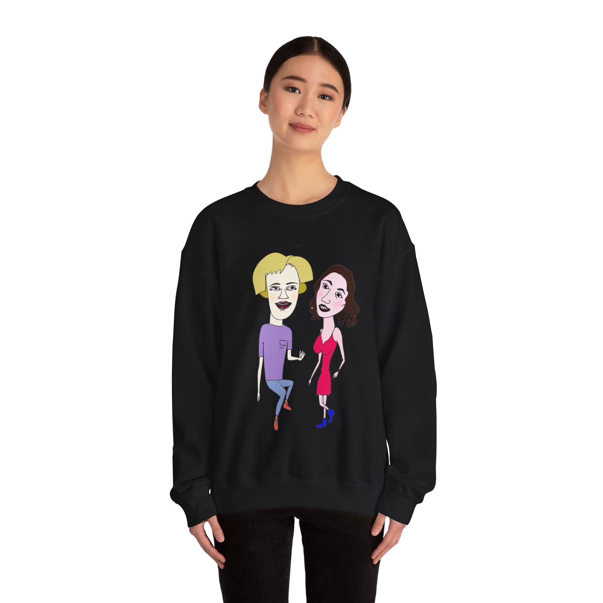 Female model wearing a black cartoon couple graphic crewneck sweatshirt
