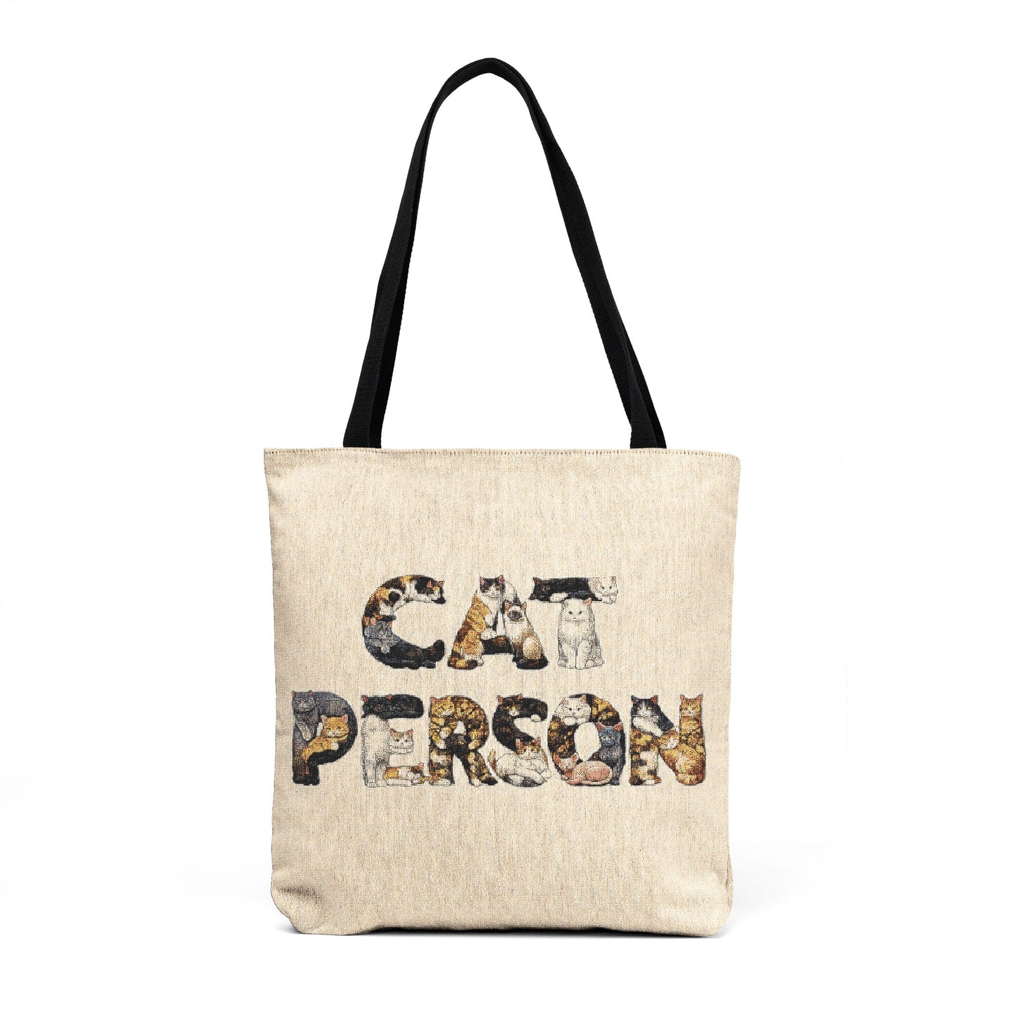 Front view of the Cat Person woven tote bag with illustrated cat artwork and black shoulder straps