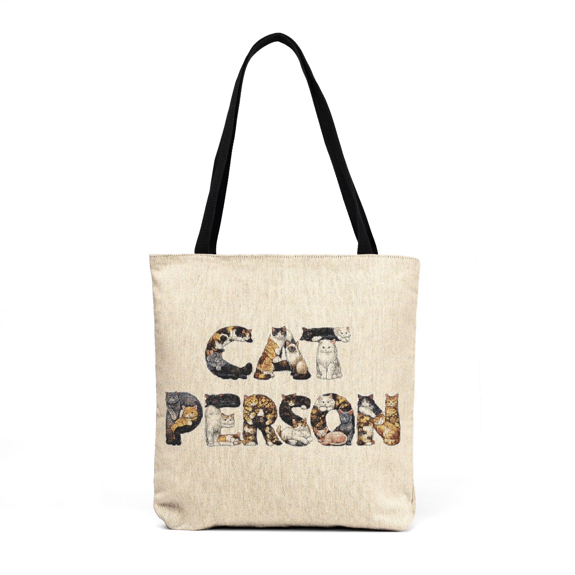 Front view of the Cat Person woven tote bag with illustrated cat artwork and black shoulder straps
