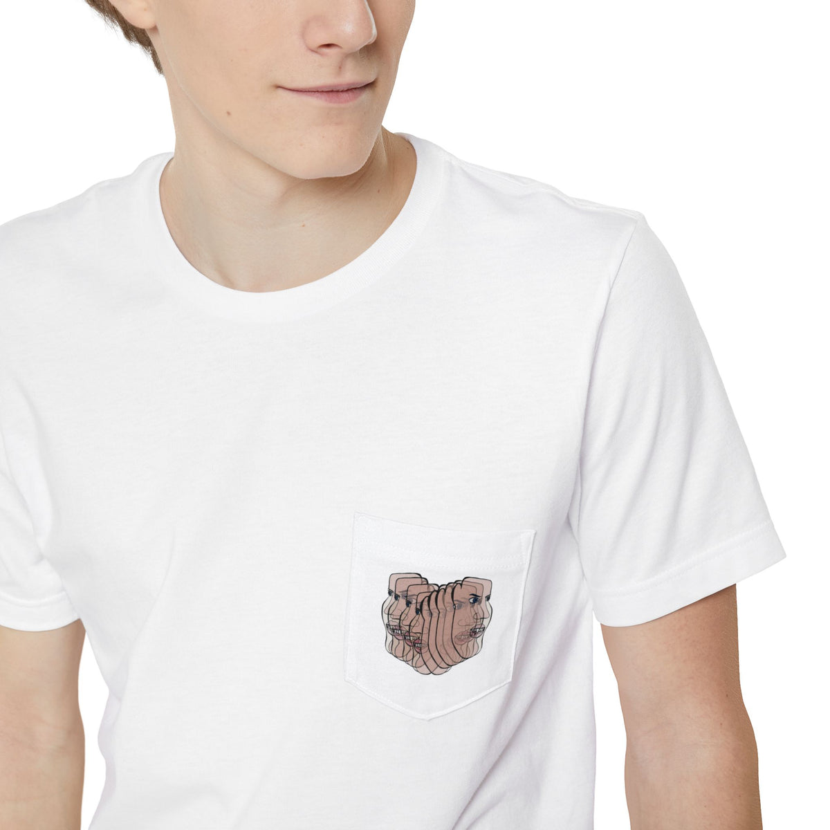 Close-up of the Charlie Deluxe abstract face graphic pocket on a white T-shirt