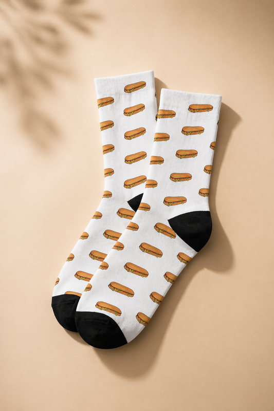 White chopped cheese crew socks with a repeating sandwich pattern, funny NYC-inspired streetwear novelty socks made from soft unisex cotton.