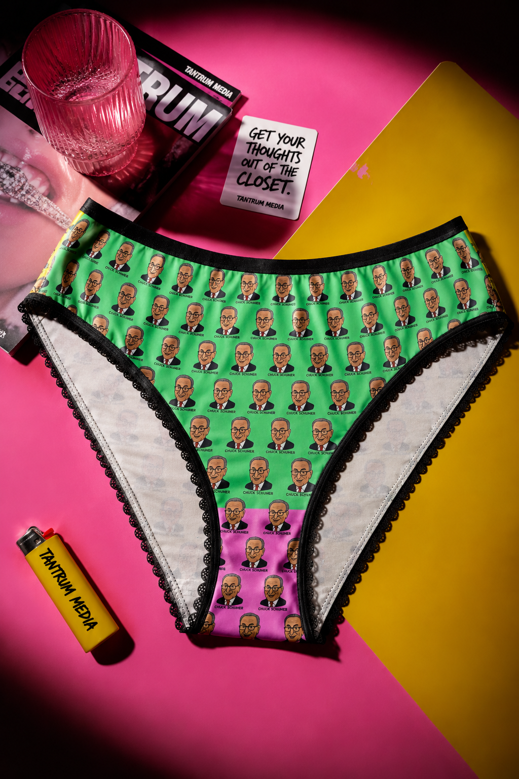 Front view of Chuck Schumer women's panties with a colorful all-over cartoon face pattern.