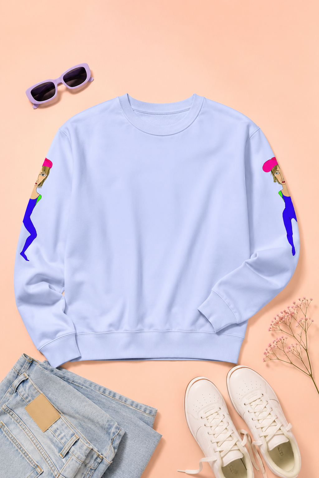 Light blue Cody graphic unisex crewneck sweatshirt flat lay mockup on pastel peach background
