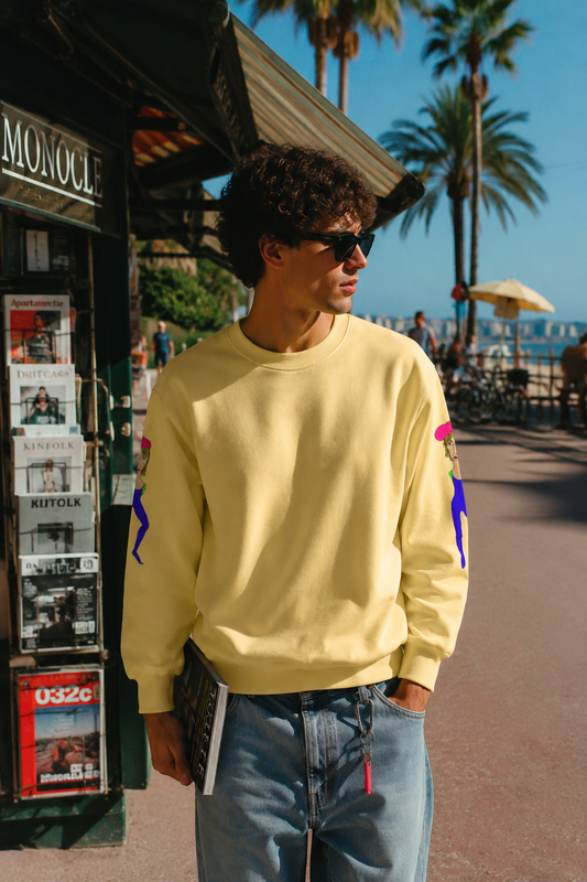 Cody graphic unisex crewneck sweatshirt in yellow worn by Gen Z male at beach town magazine kiosk lifestyle mockup