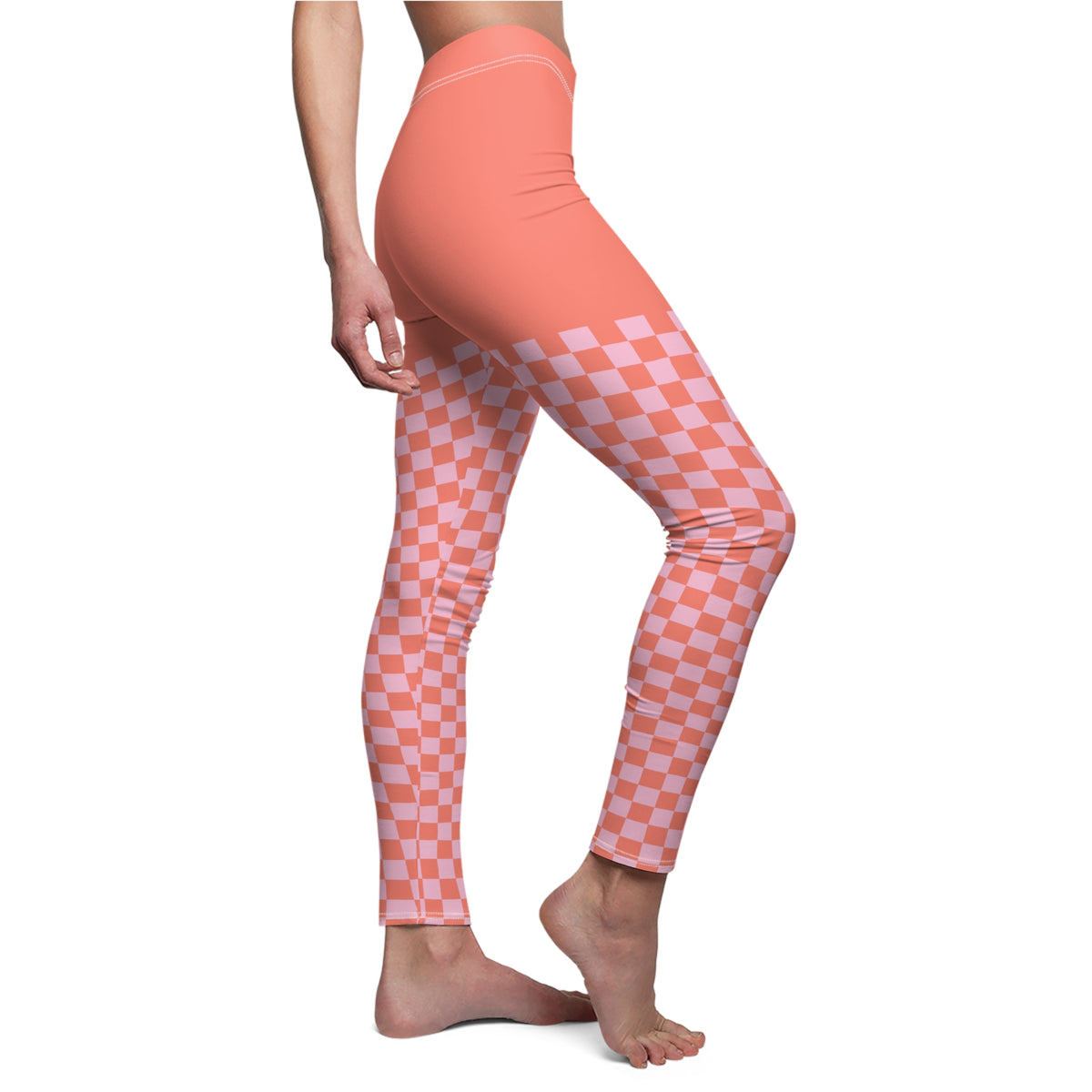 Model walking wearing coral gridlock leggings in a gym setting
