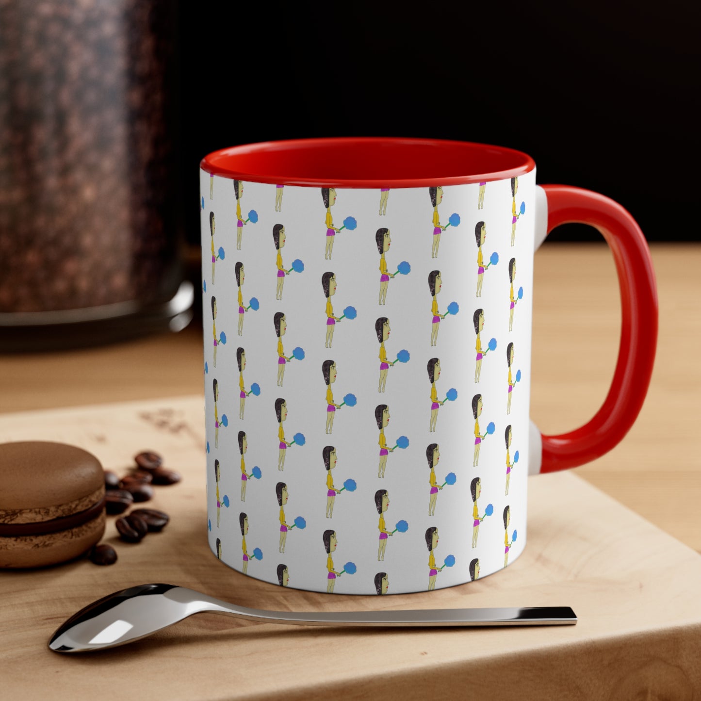 Cotton Candy Illustrated Ceramic Mug with red handle and colorful original artwork styled beside coffee and a spoon.