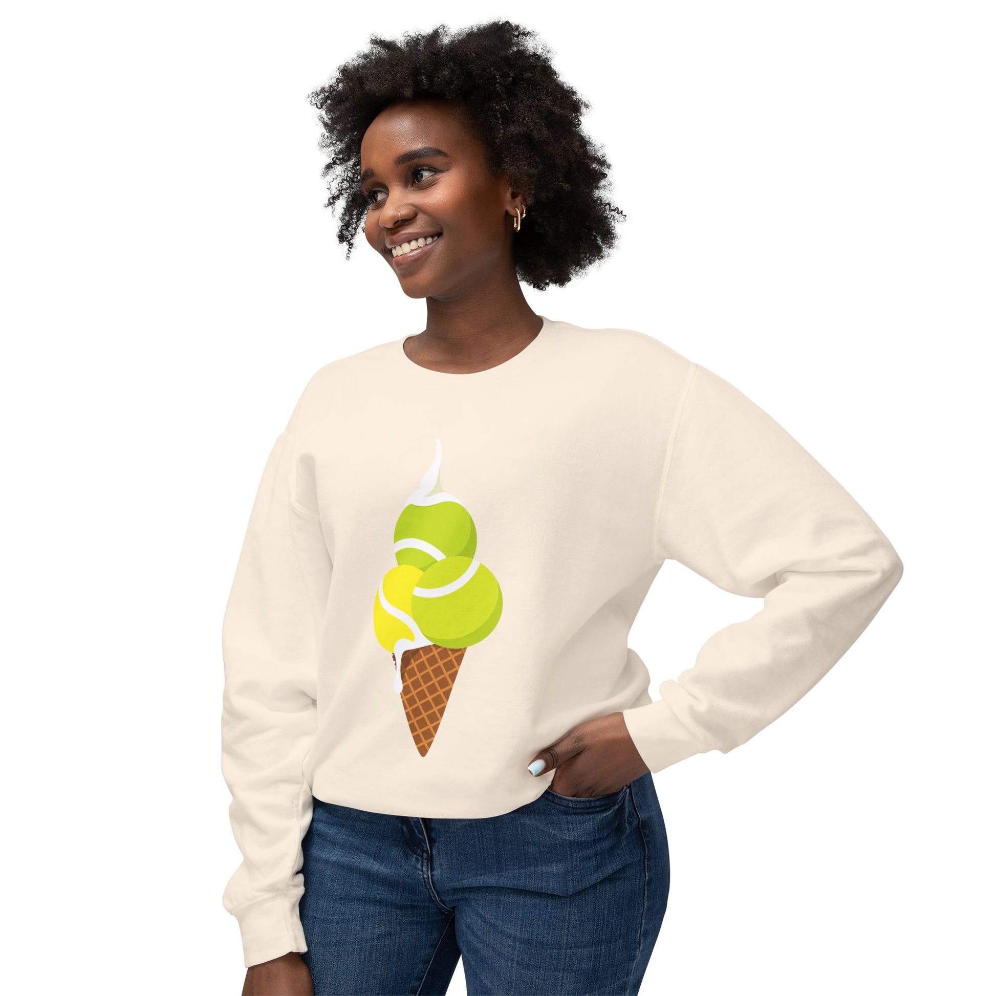 Woman modeling cream tennis graphic sweatshirt with colorful tennis ball ice cream design