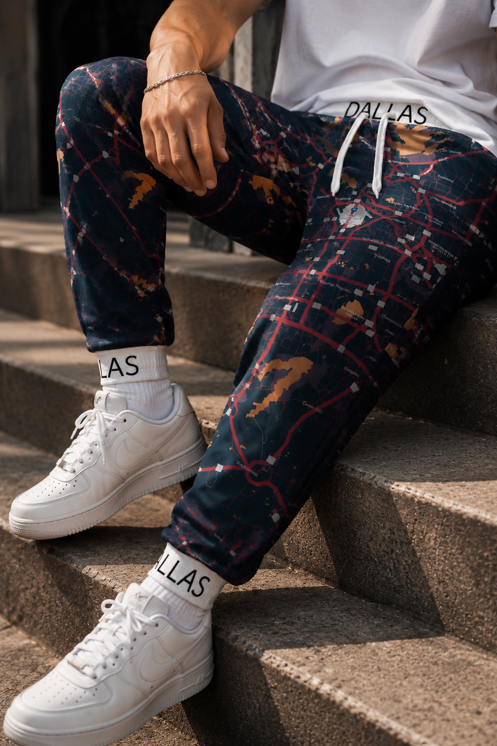 Close-up of Dallas Map Joggers showing detailed city map artwork, fabric texture, and ankle cuff design.