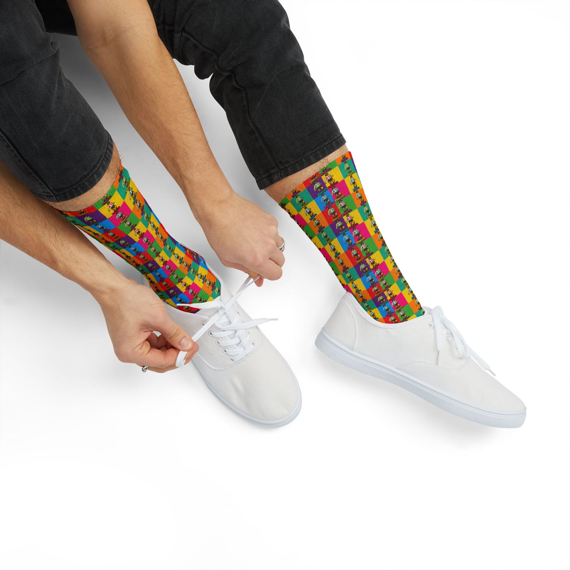 Millennial male wearing Diego Maradona crew socks in living room