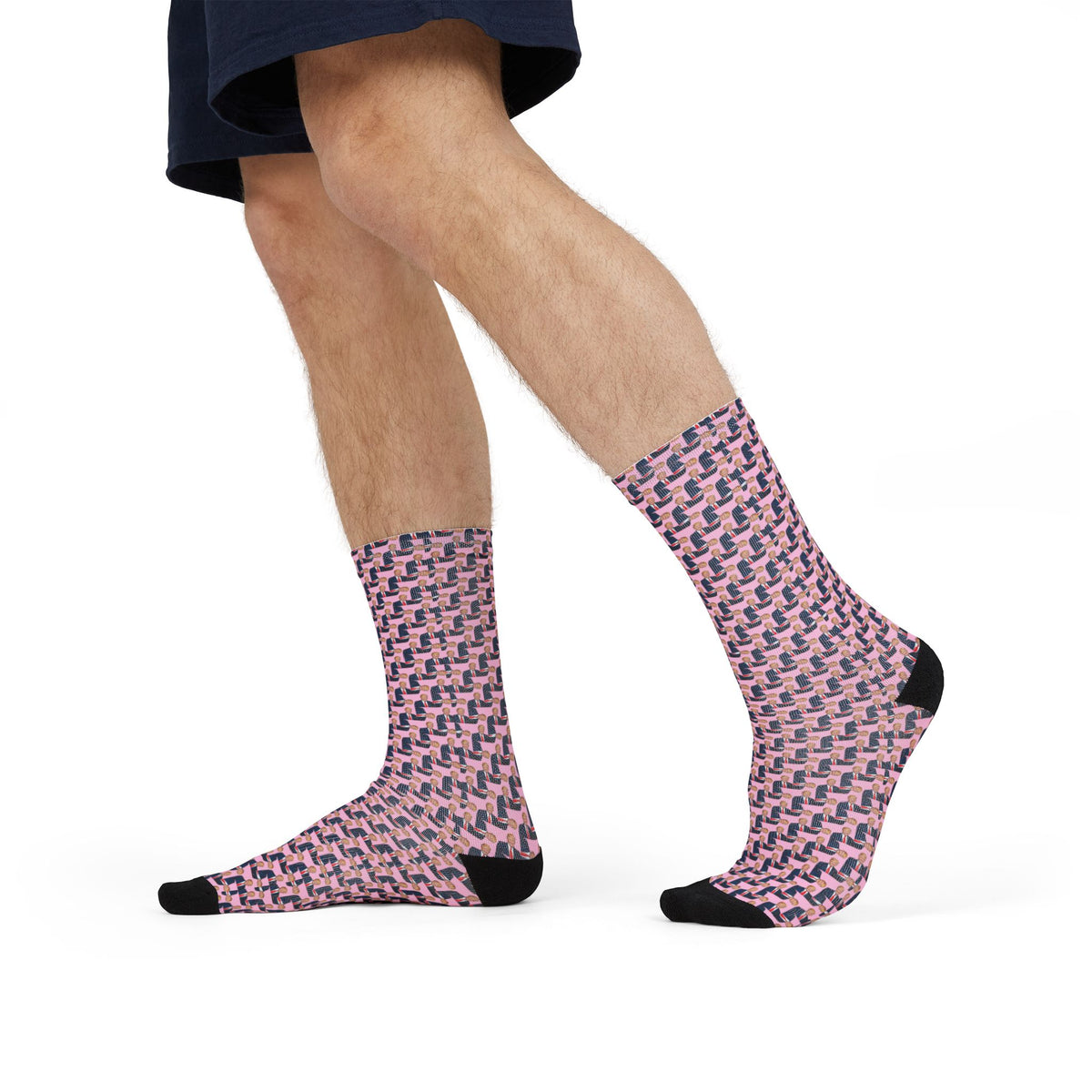 Side walking view of Donald Trump pink crew socks with repeating portrait print