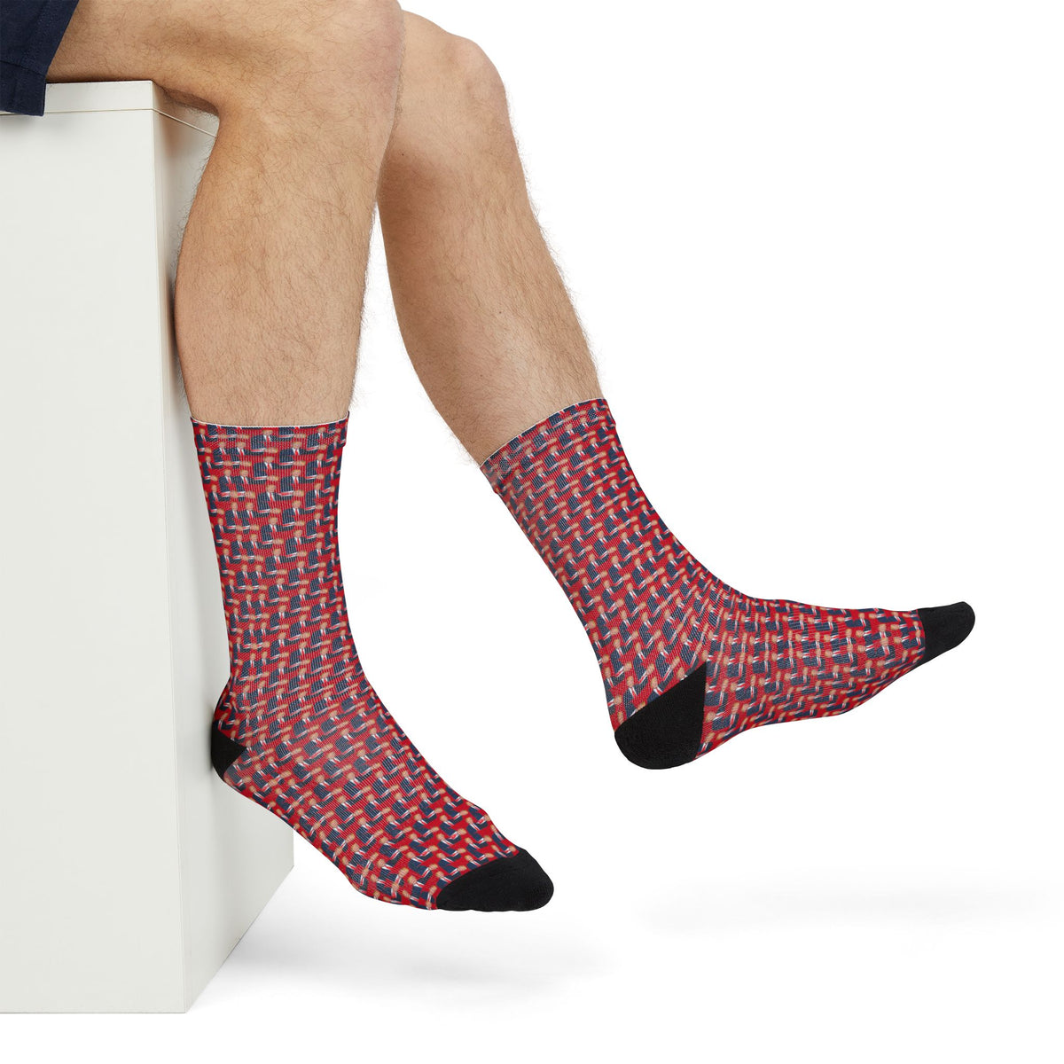 Donald Trump red crew socks shown in seated casual lifestyle view with black toe detail