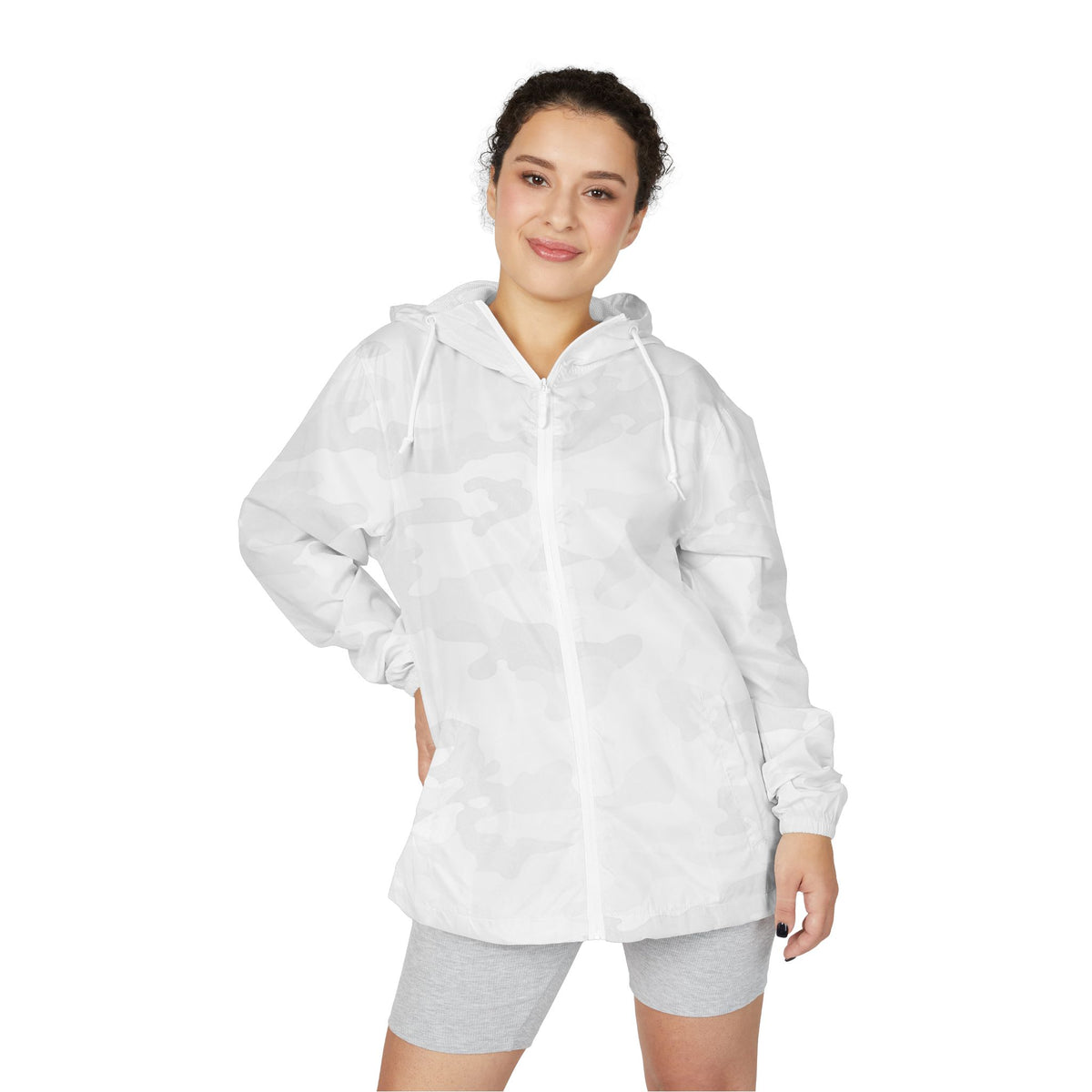 Woman wearing the Essential Lightweight White Camo Windbreaker Jacket, front view