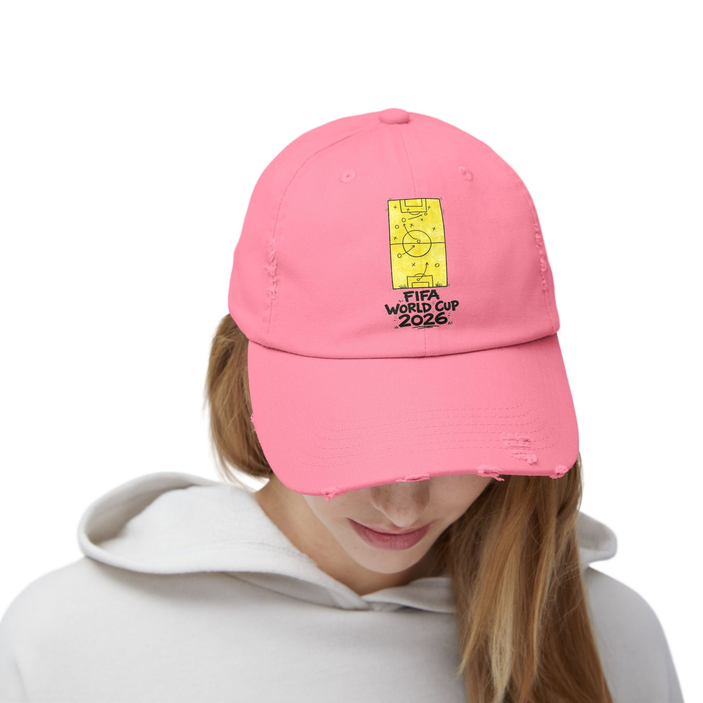 Woman wearing pink FIFA World Cup 2026 distressed dad hat casual soccer fan fashion