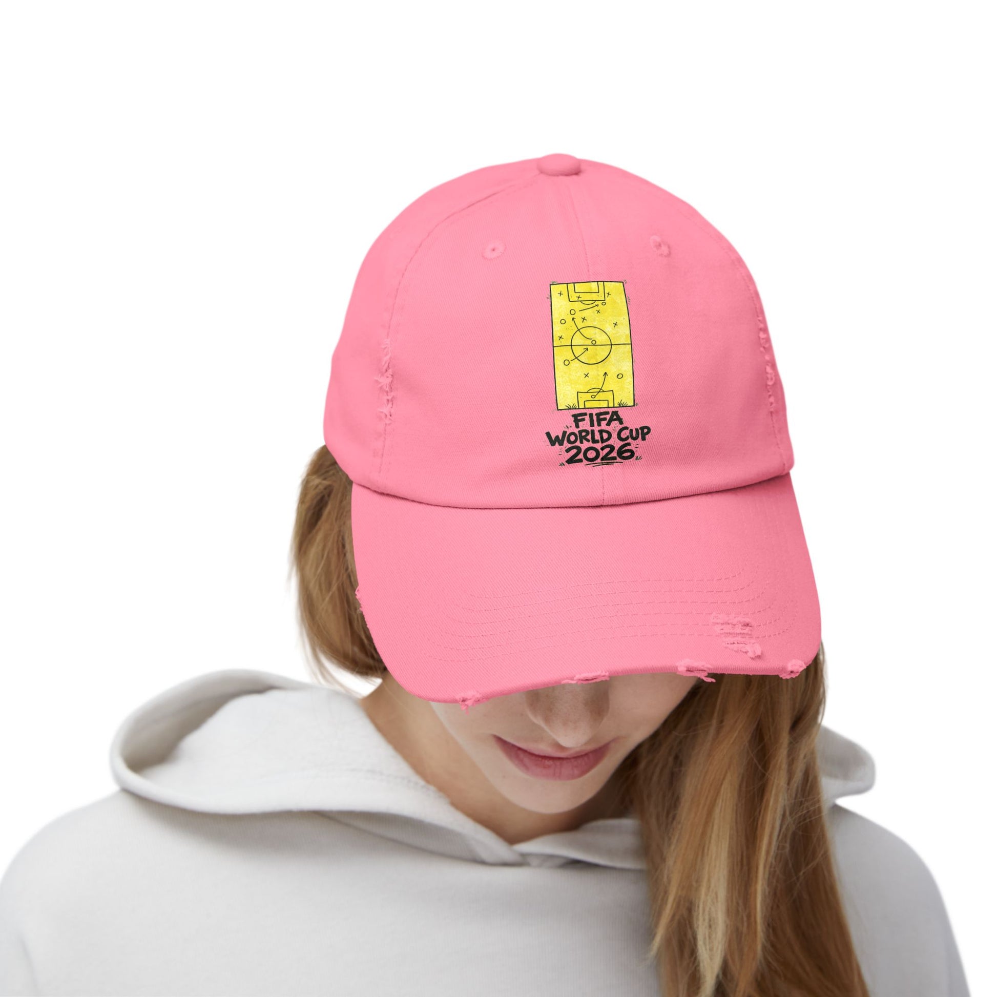 Woman wearing pink FIFA World Cup 2026 distressed dad hat casual soccer fan fashion