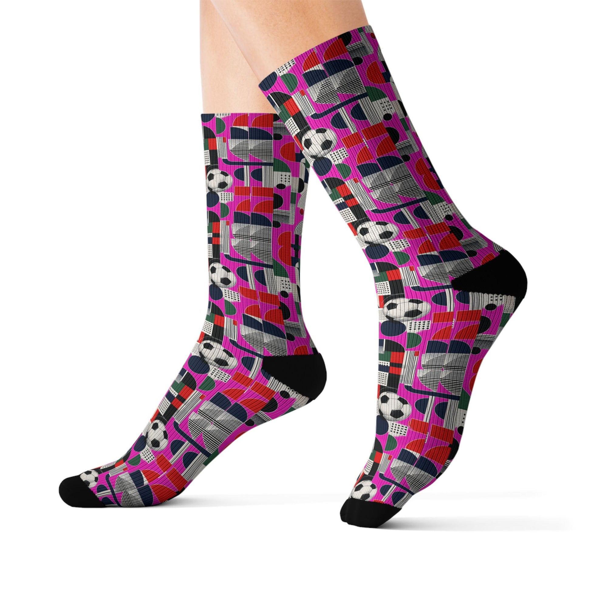 Person wearing FIFA World Cup 2026 soccer fan crew socks with vibrant soccer-inspired geometric design.