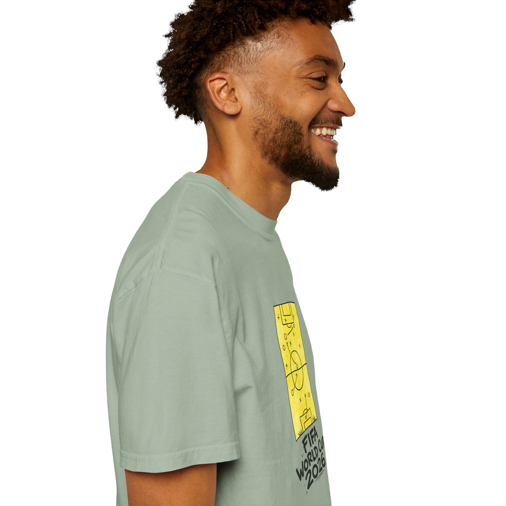 Side view of sage green FIFA World Cup 2026 soccer fan tee