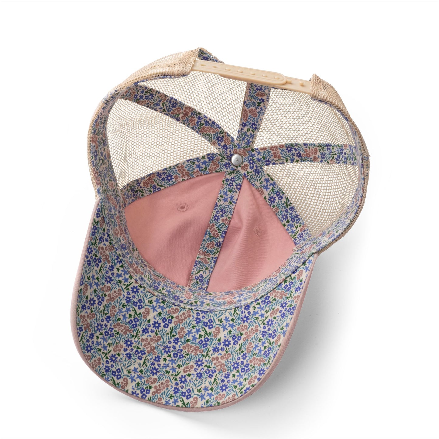 Underside of floral mesh trucker hat.