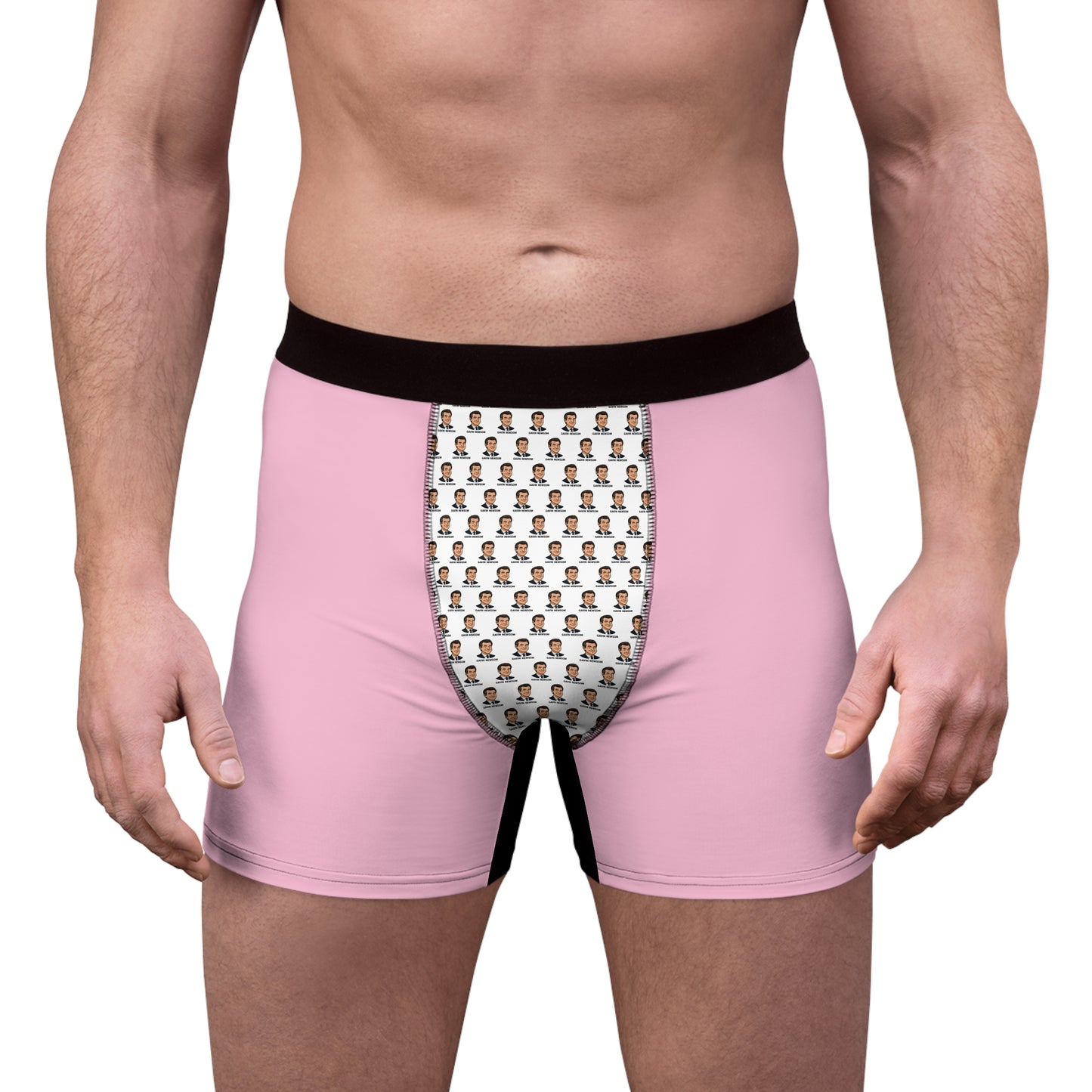 Funny political boxer briefs for men, Gavin Newsom face print underwear, pink design, front view, male model wearing graphic underwear, comfortable fit, statement mens underwear
