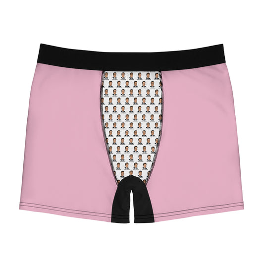 Funny political boxer briefs for men, Gavin Newsom face print underwear, pink design, front view, graphic panel detail, statement mens underwear