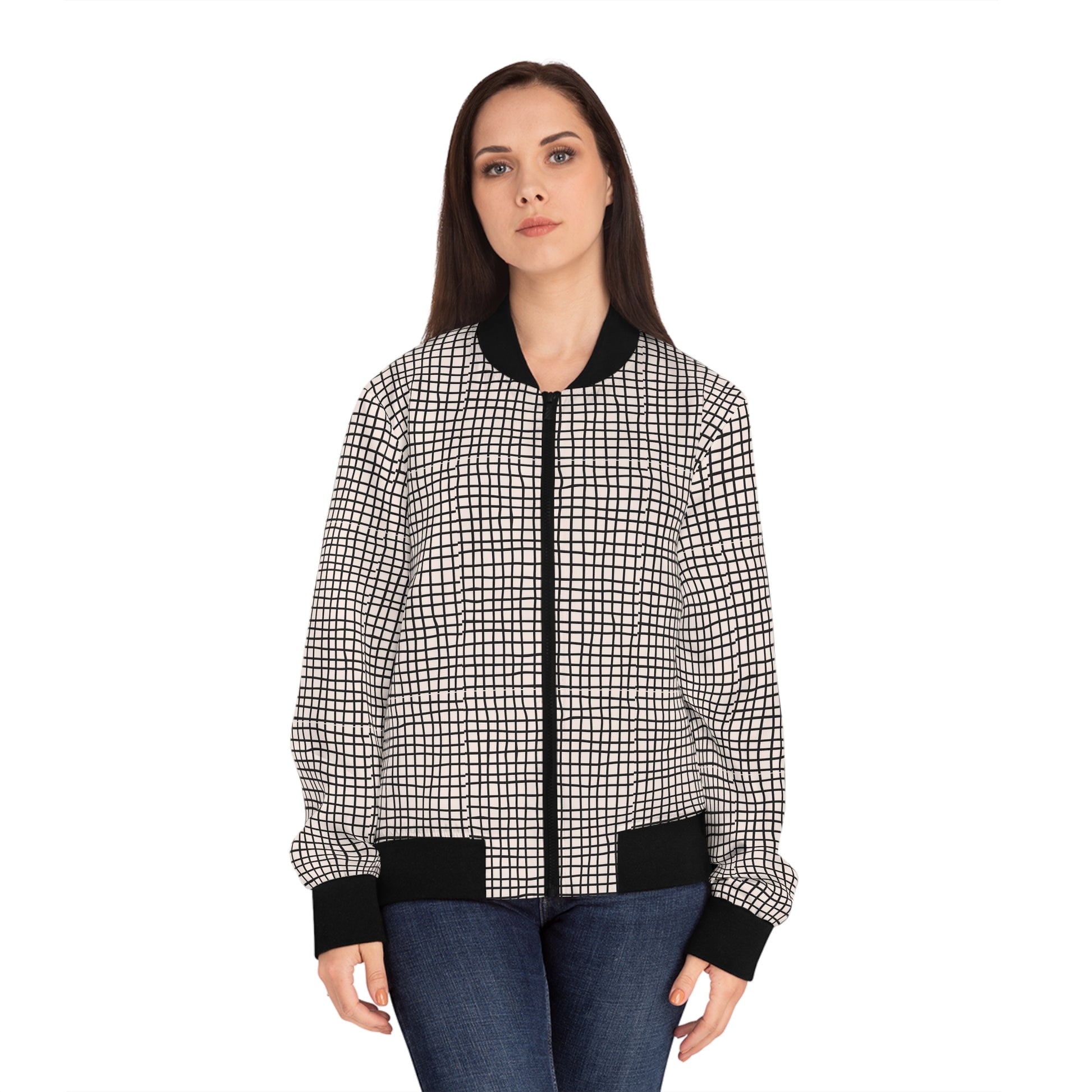 Woman modeling a black and white geometric grid bomber jacket from the front.