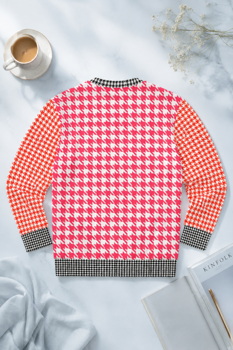Back flat lay of the Goose Foot Pattern Sweatshirt showing the pink and orange pattern with black and white trim.