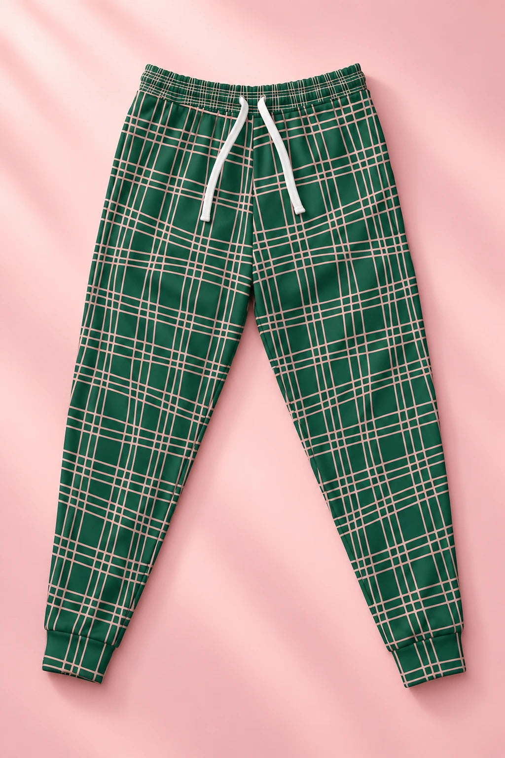 Front flat lay of green plaid joggers with pink line pattern and white drawstring