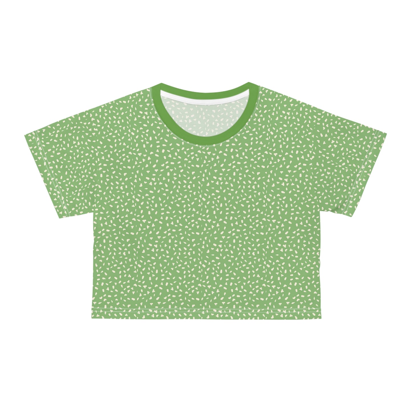 Front view of green speckled crop top with minimalist nature-inspired pattern
