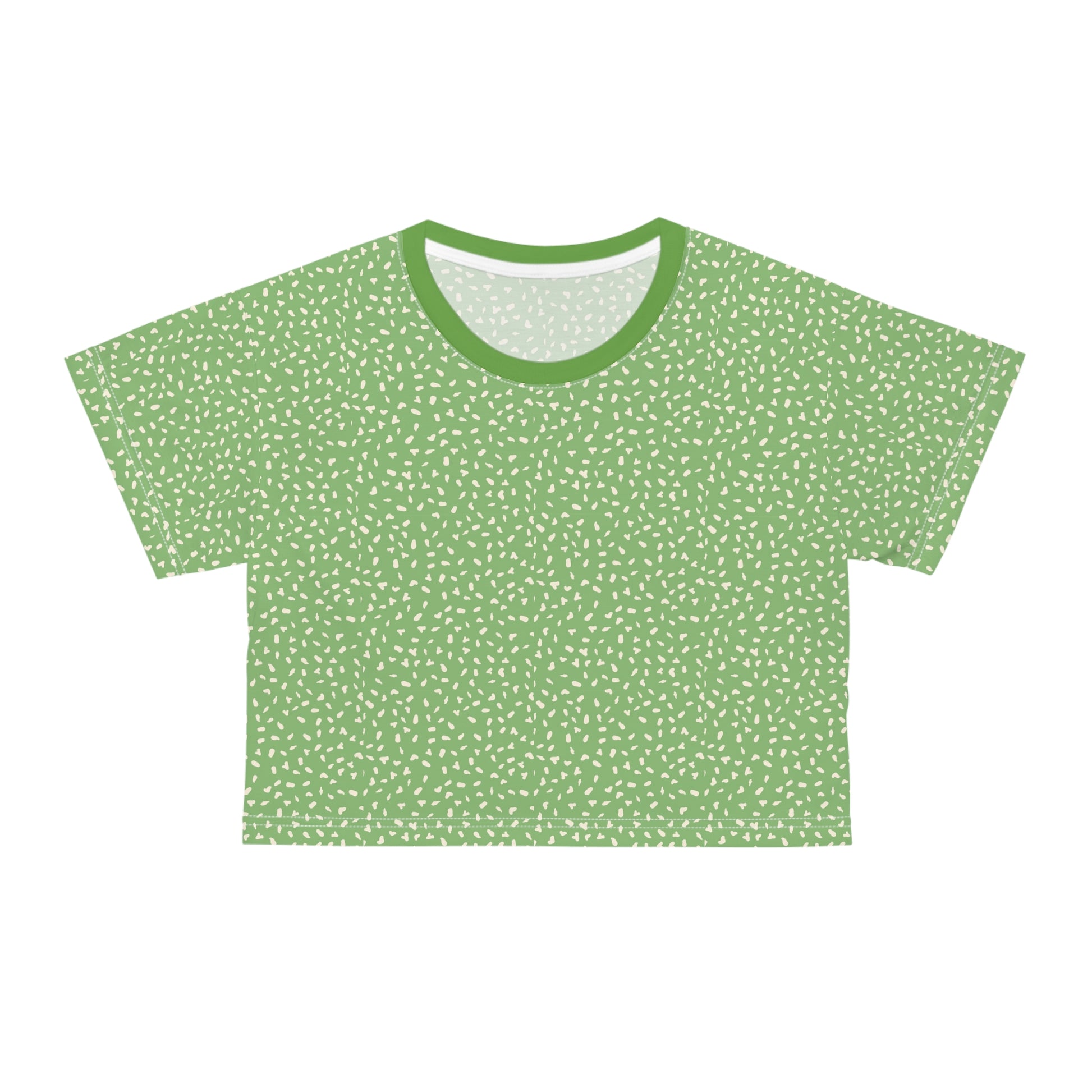 Front view of green speckled crop top with minimalist nature-inspired pattern