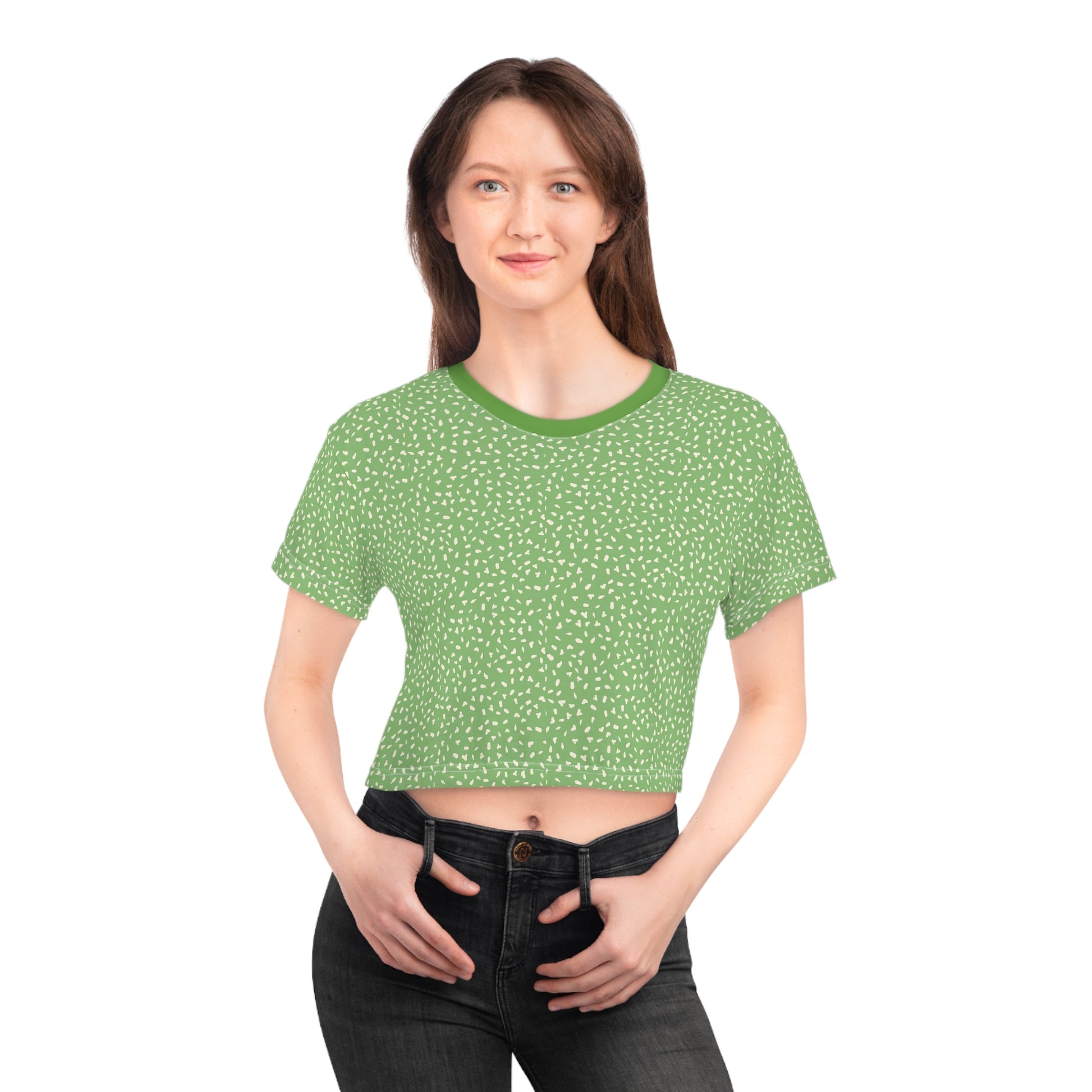 Female model wearing green speckled crop top with relaxed minimalist styling
