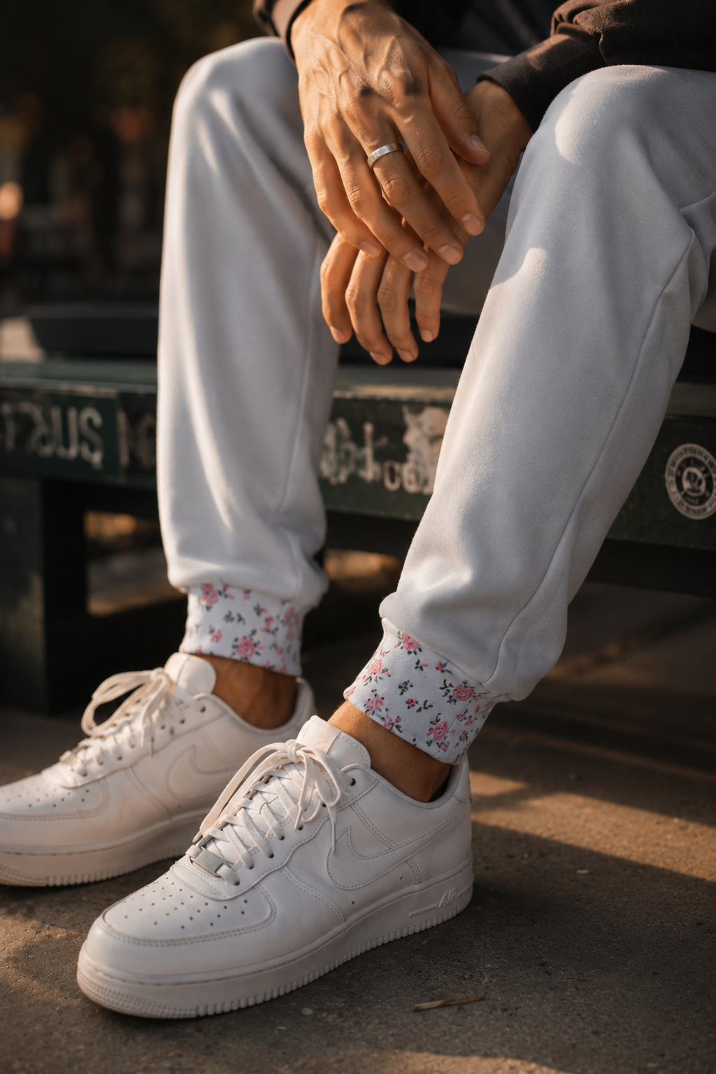 Close up of floral ankle cuff detail on grey floral joggers