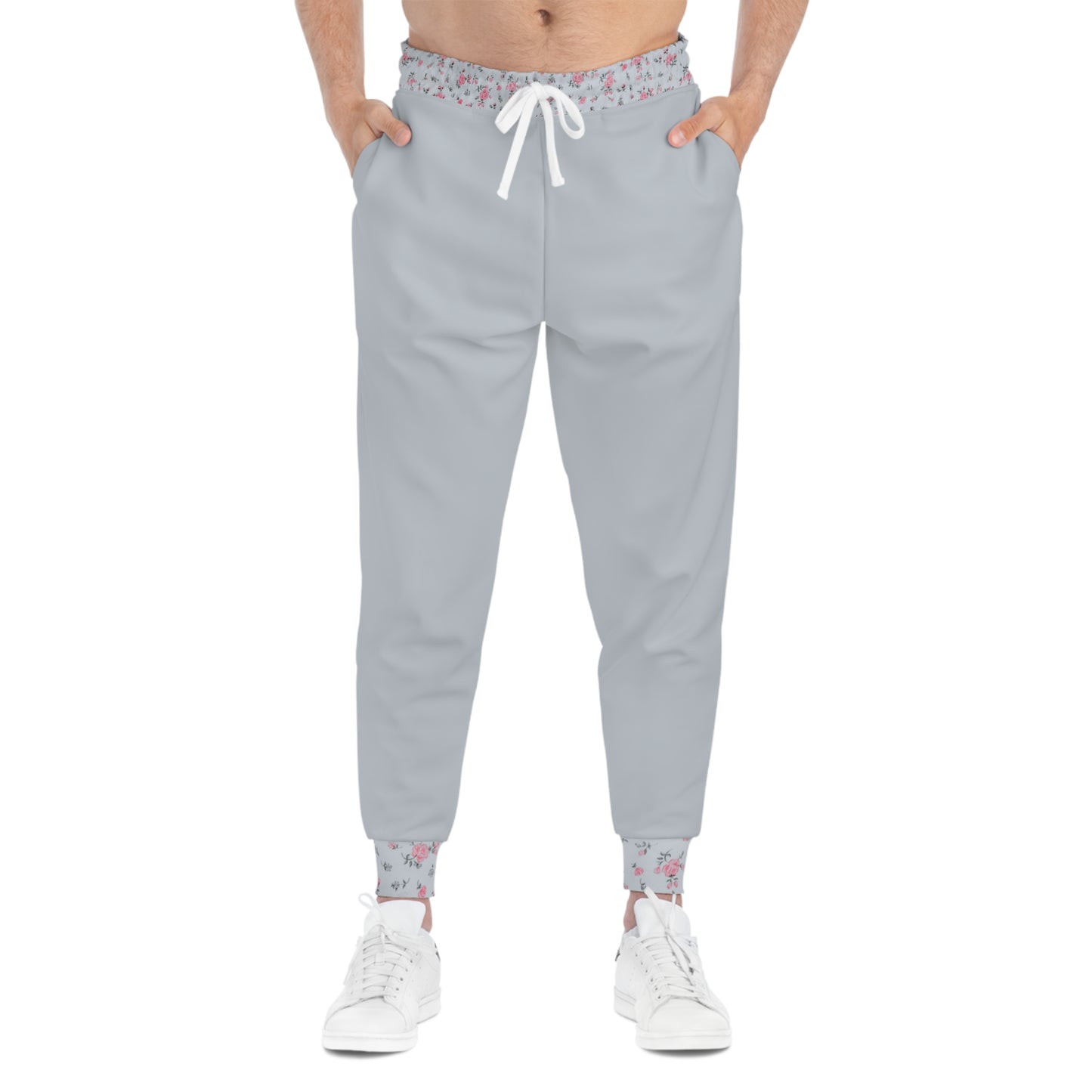 Model wearing grey floral joggers with floral trim details