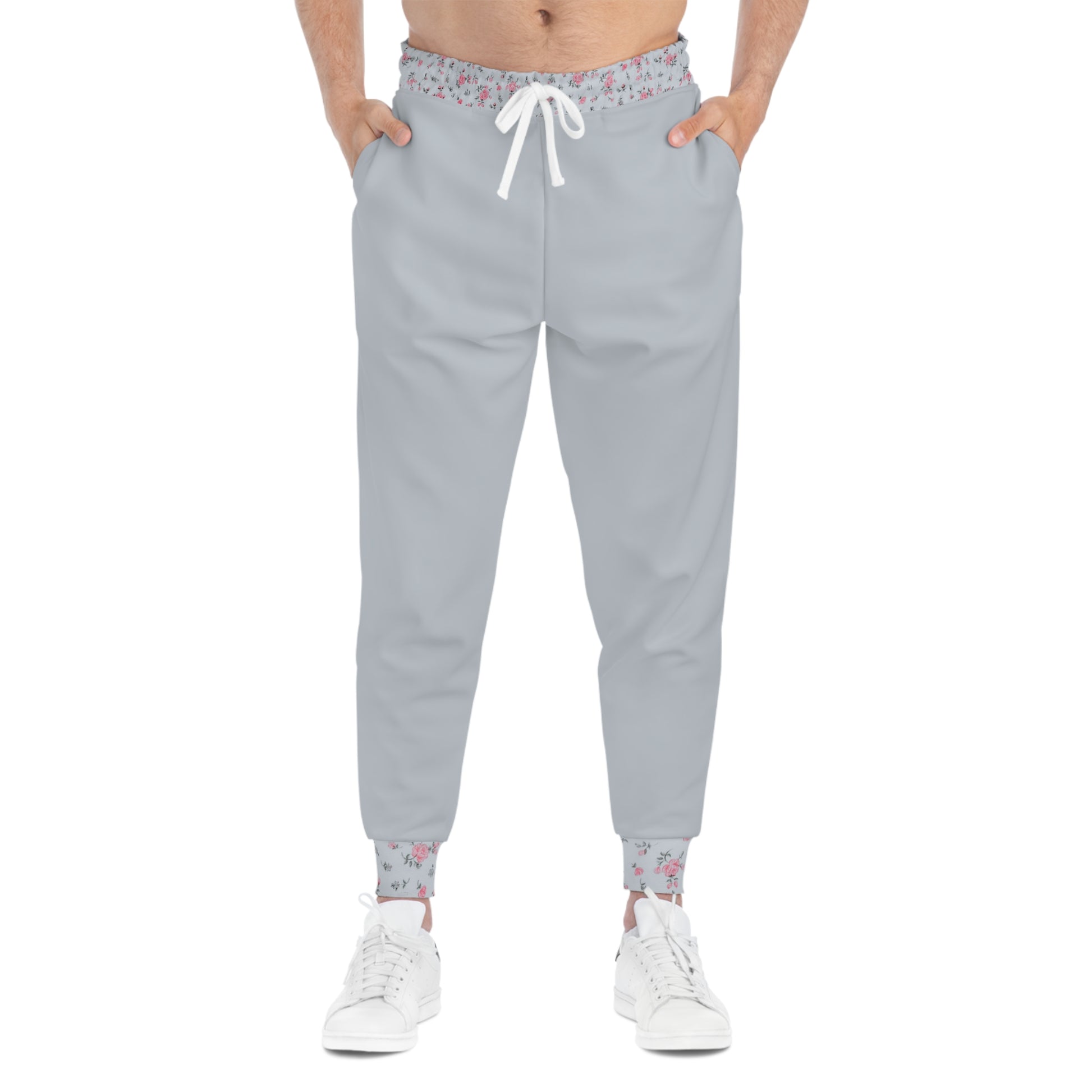 Model wearing grey floral joggers with floral trim details