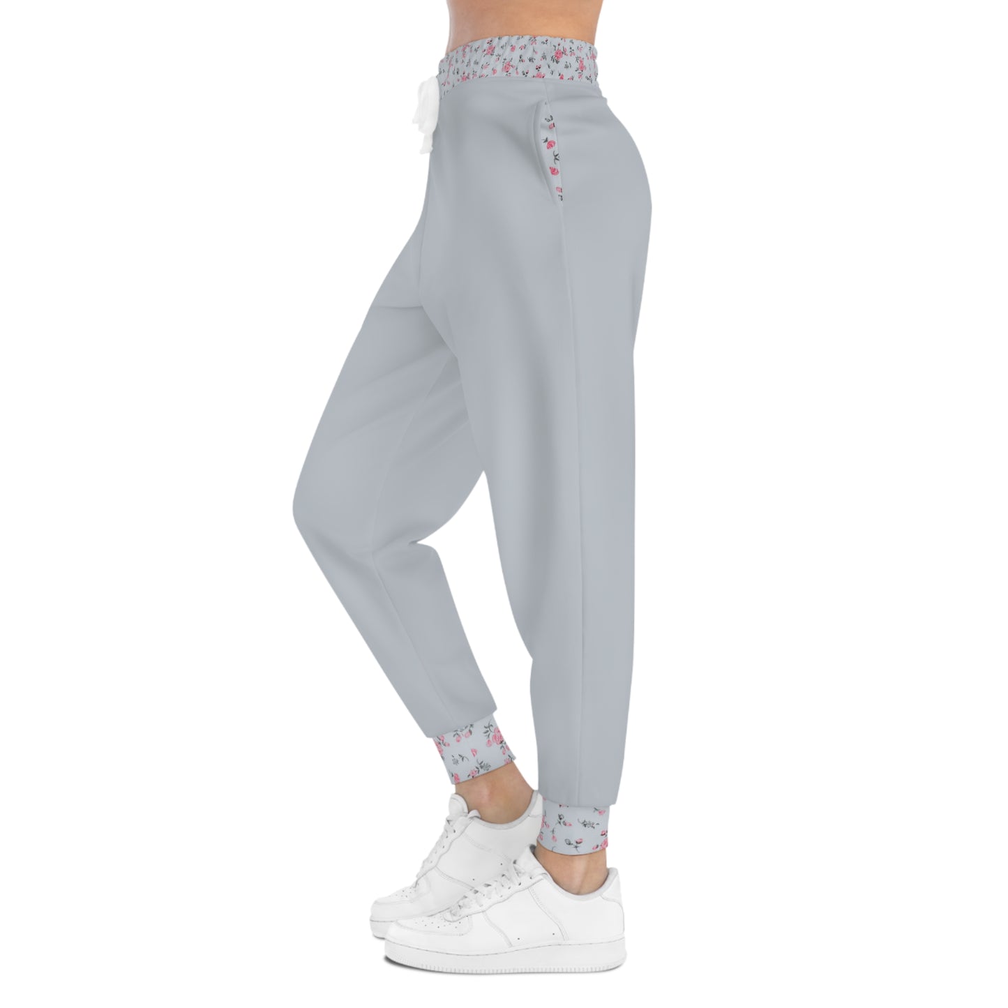 Side profile of grey floral joggers with relaxed fit