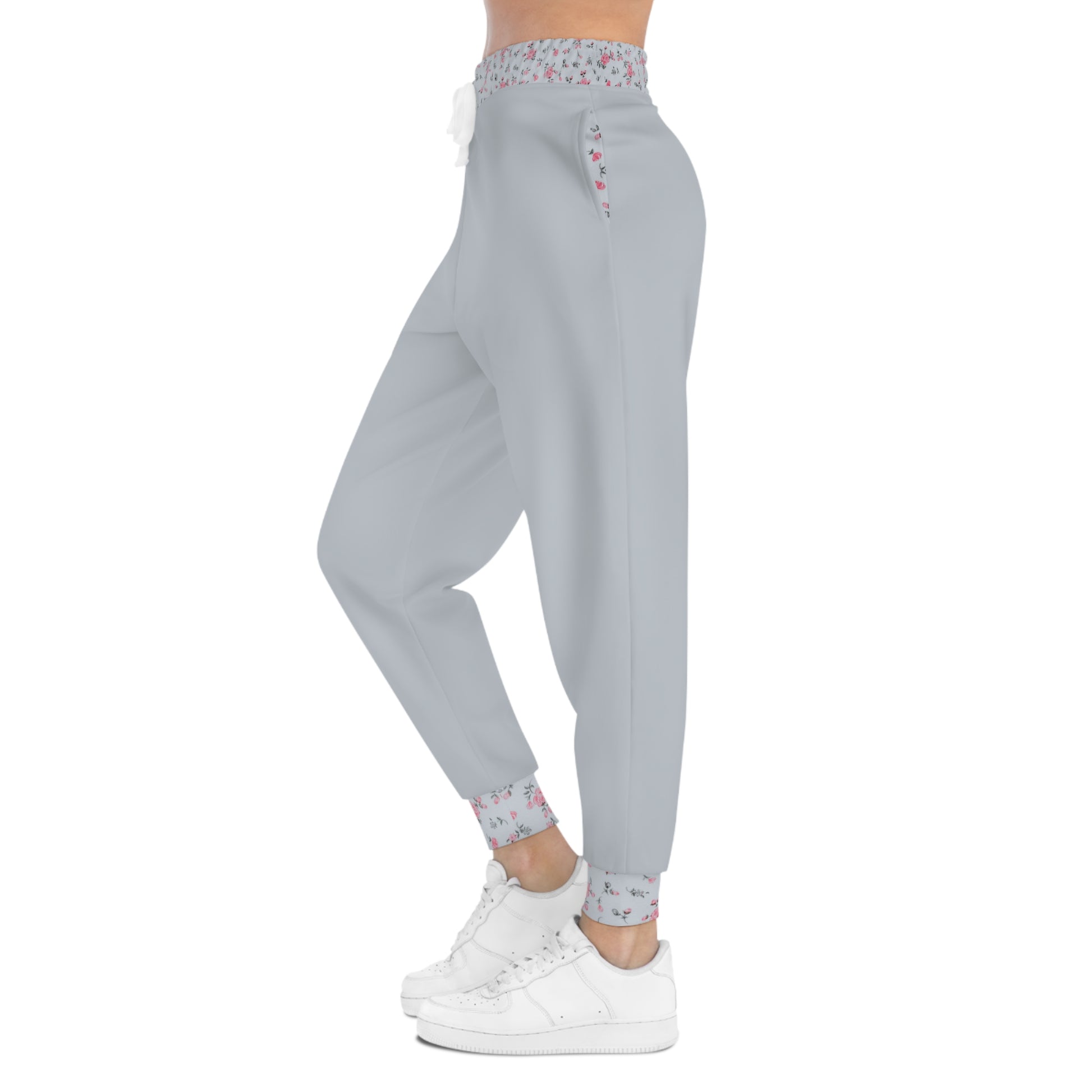 Side profile of grey floral joggers with relaxed fit