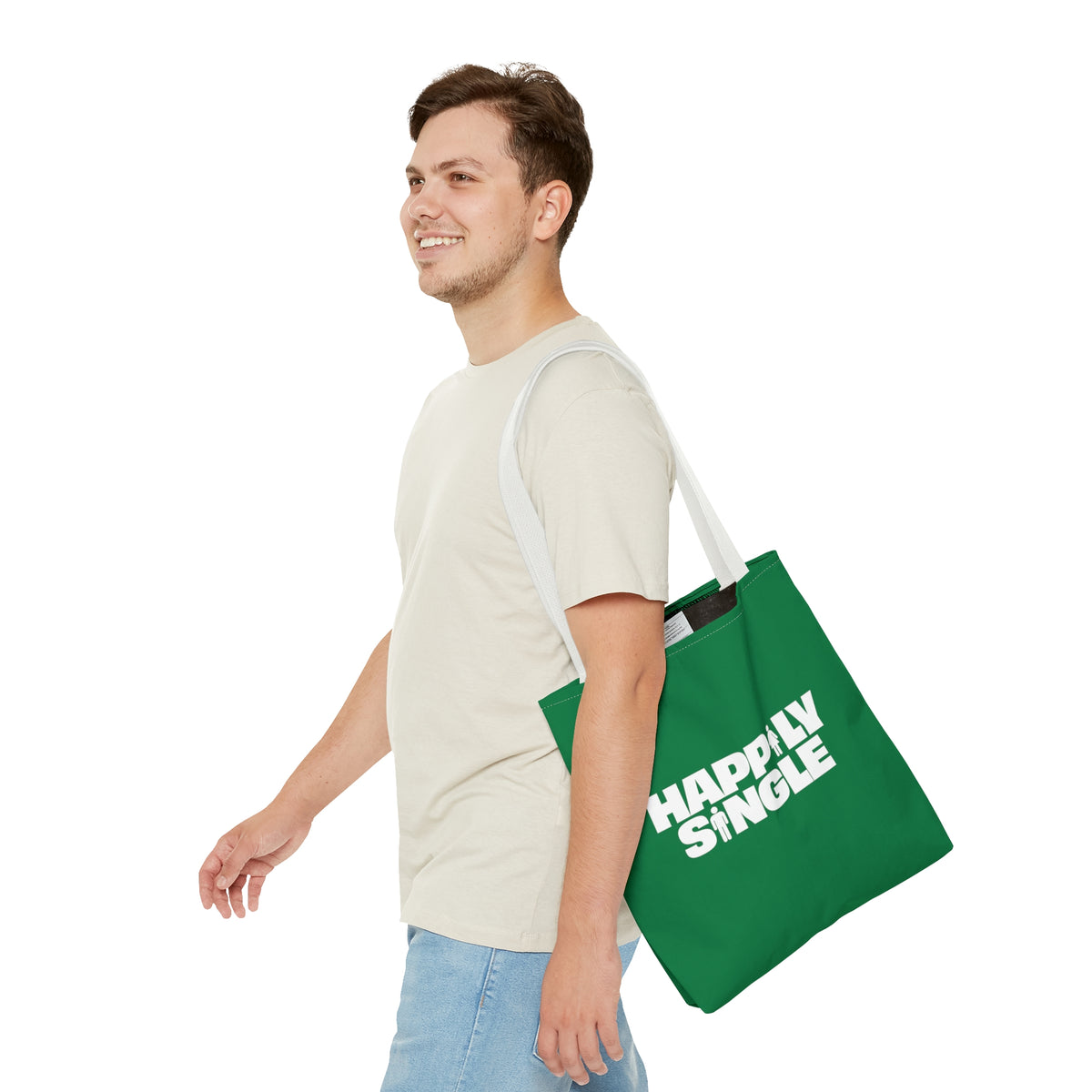 Man wearing green Happily Single tote bag over shoulder, side view