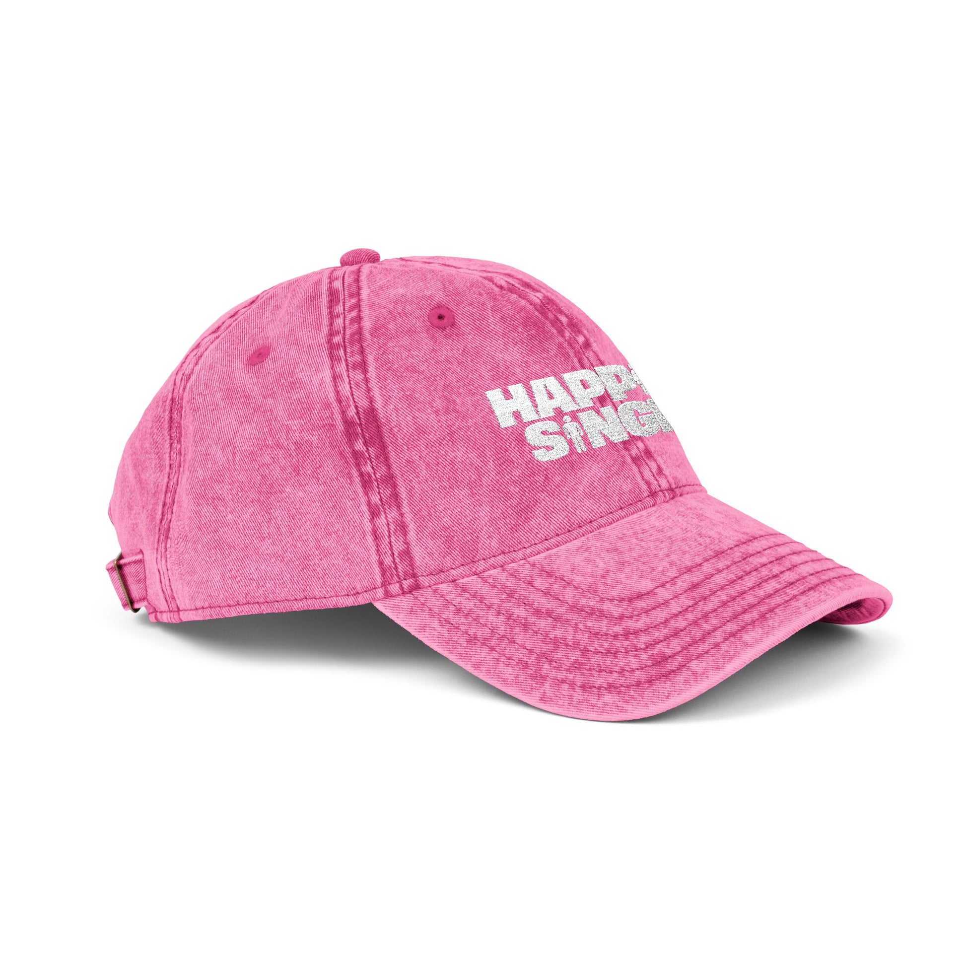 Side profile of a pink Happily Single baseball cap on a clean studio background.