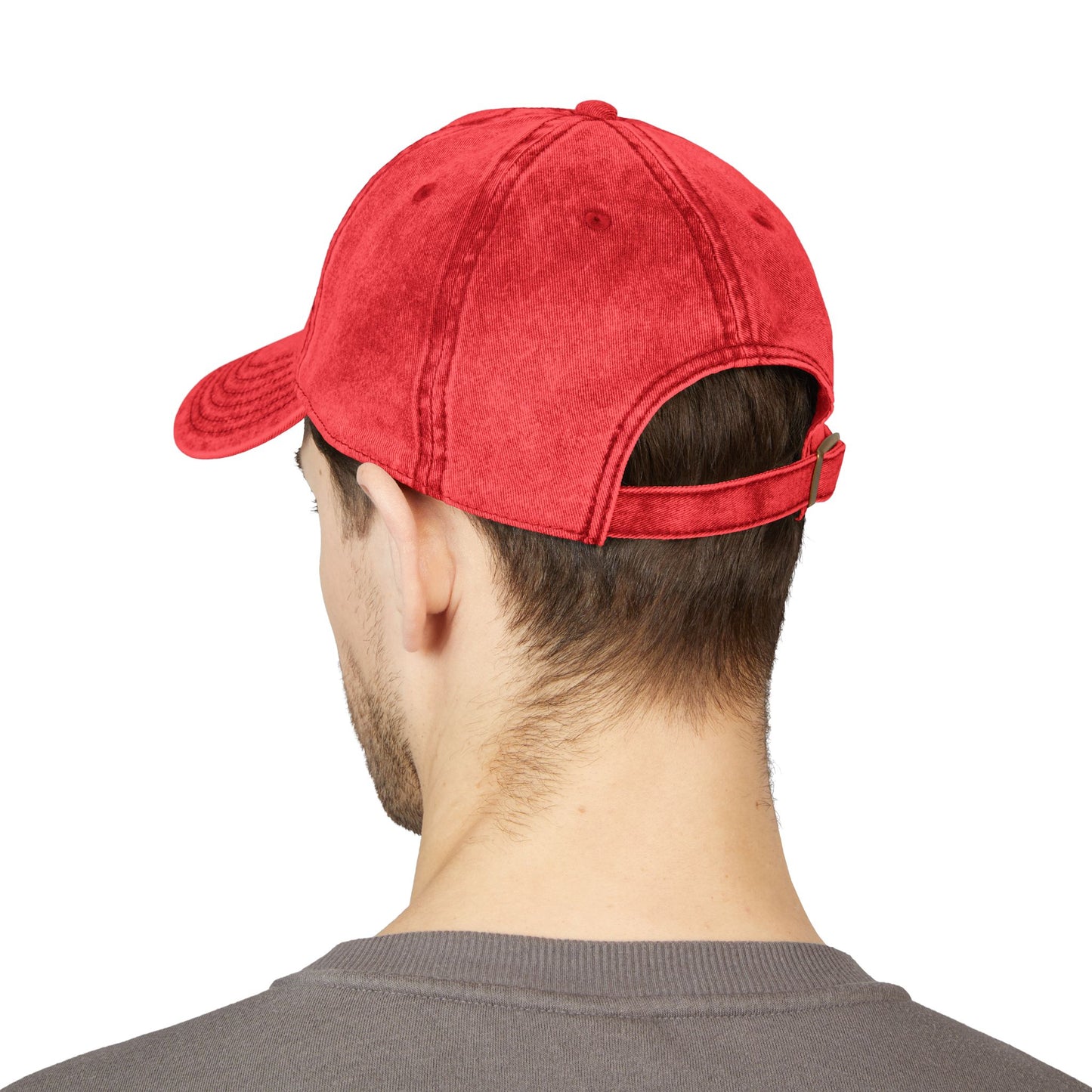 Back view of a red Happily Single baseball cap worn by a male model.