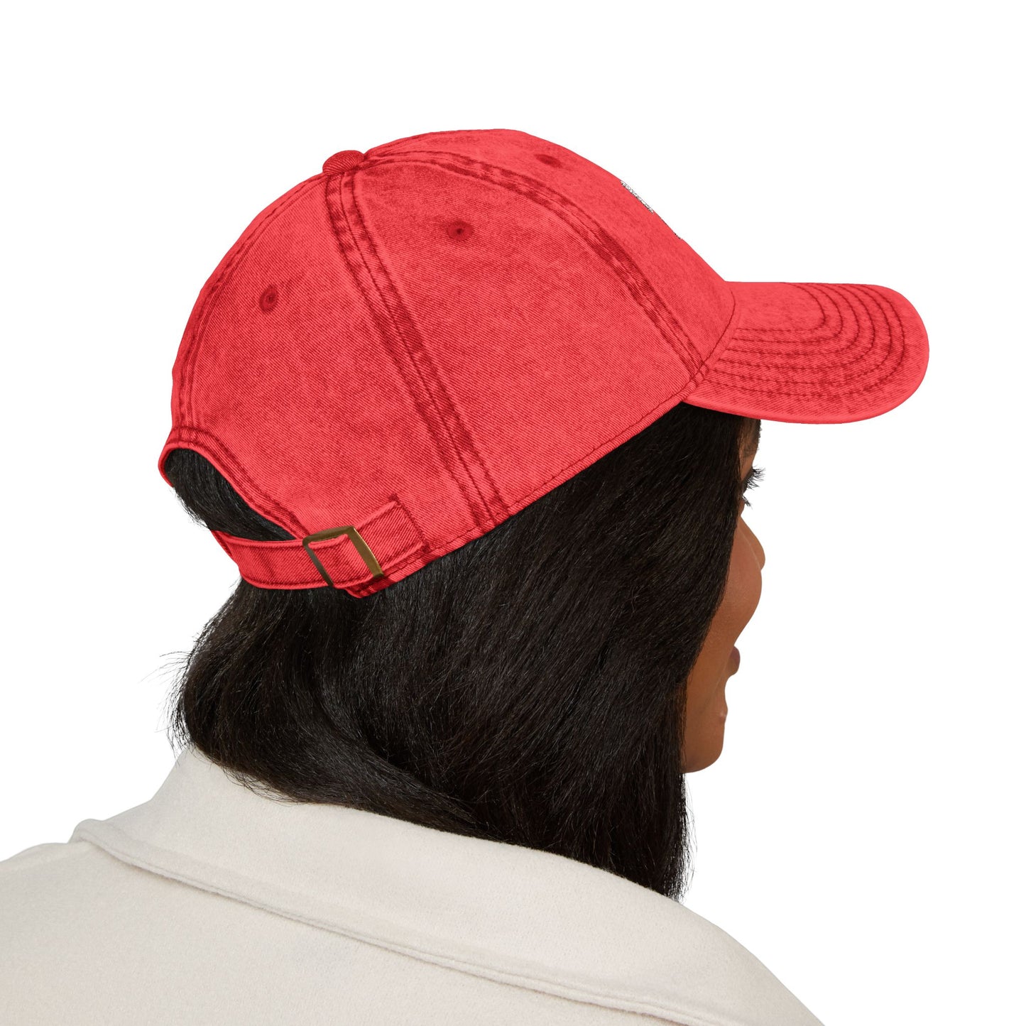Rear view of a red Happily Single baseball cap worn by a female model.