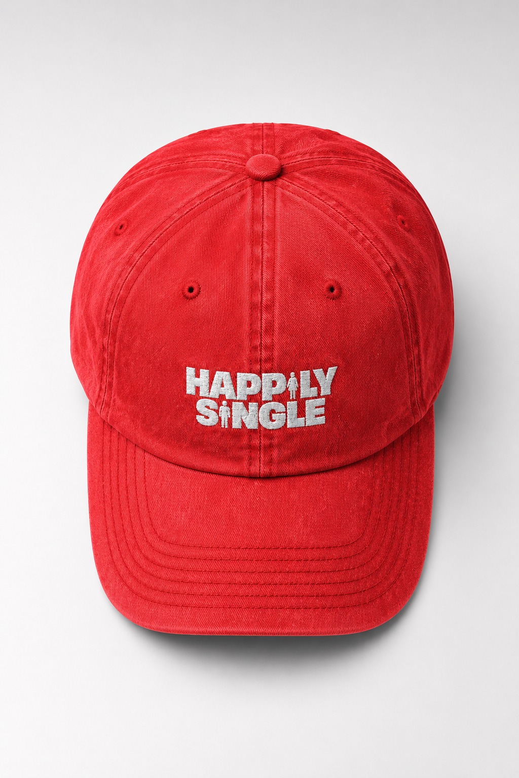 Front view of a red Happily Single vintage wash baseball cap on a clean background.