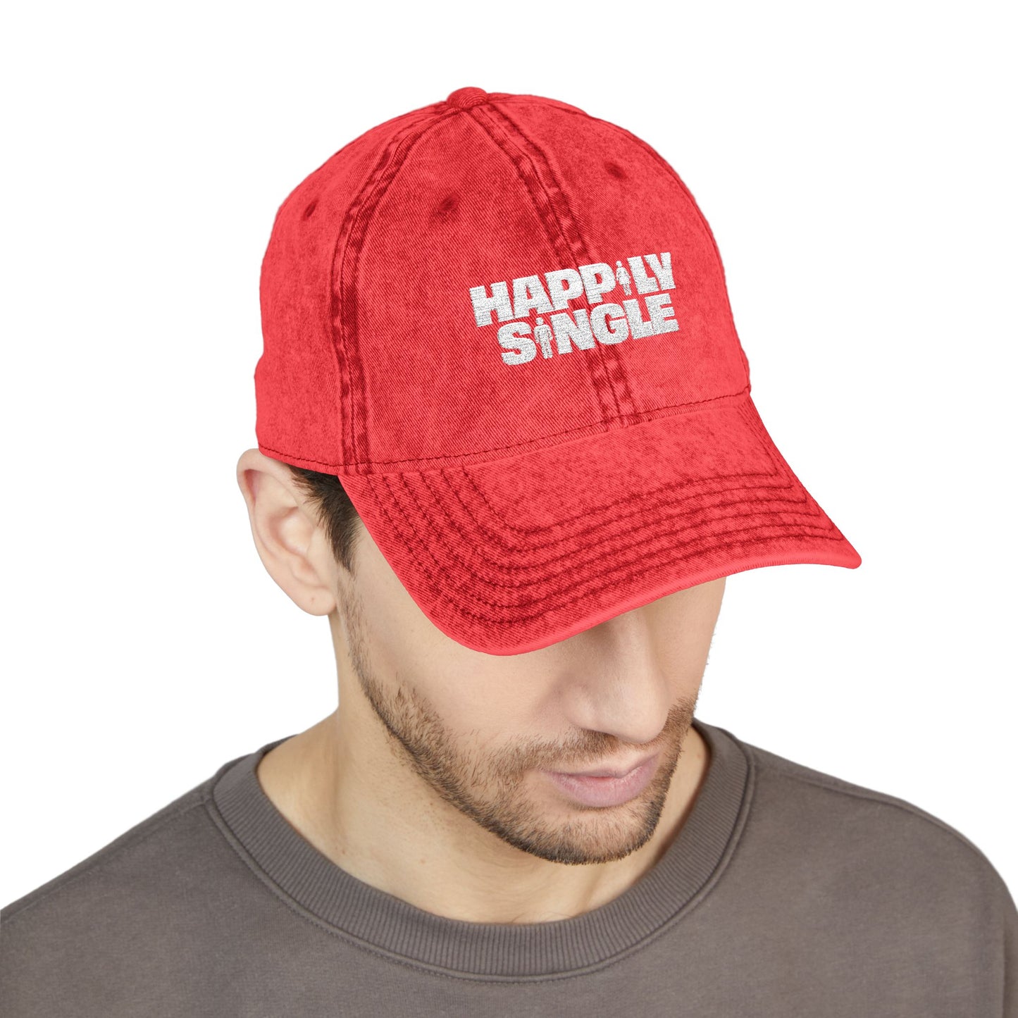 Male model wearing a red Happily Single baseball cap.