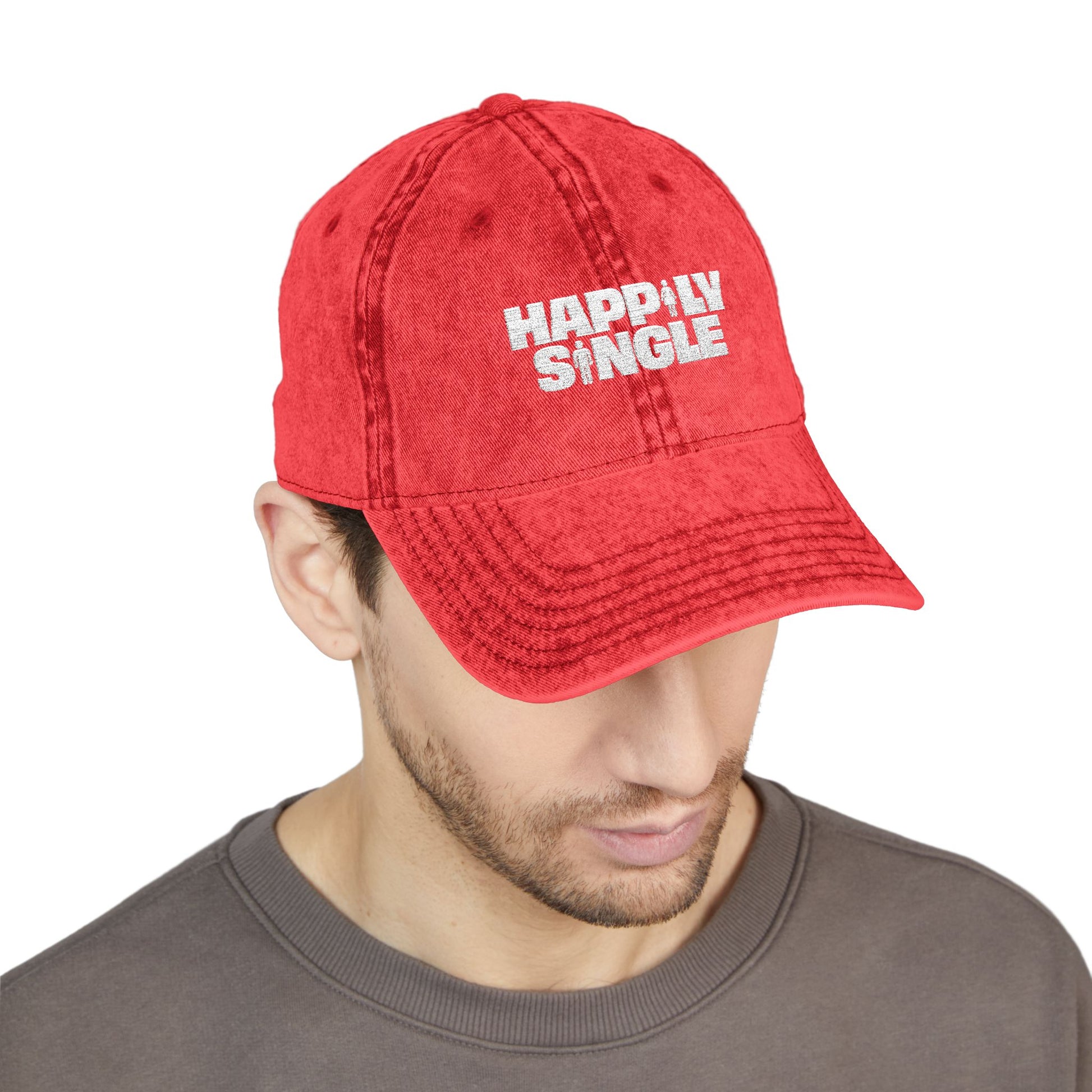 Male model wearing a red Happily Single baseball cap.