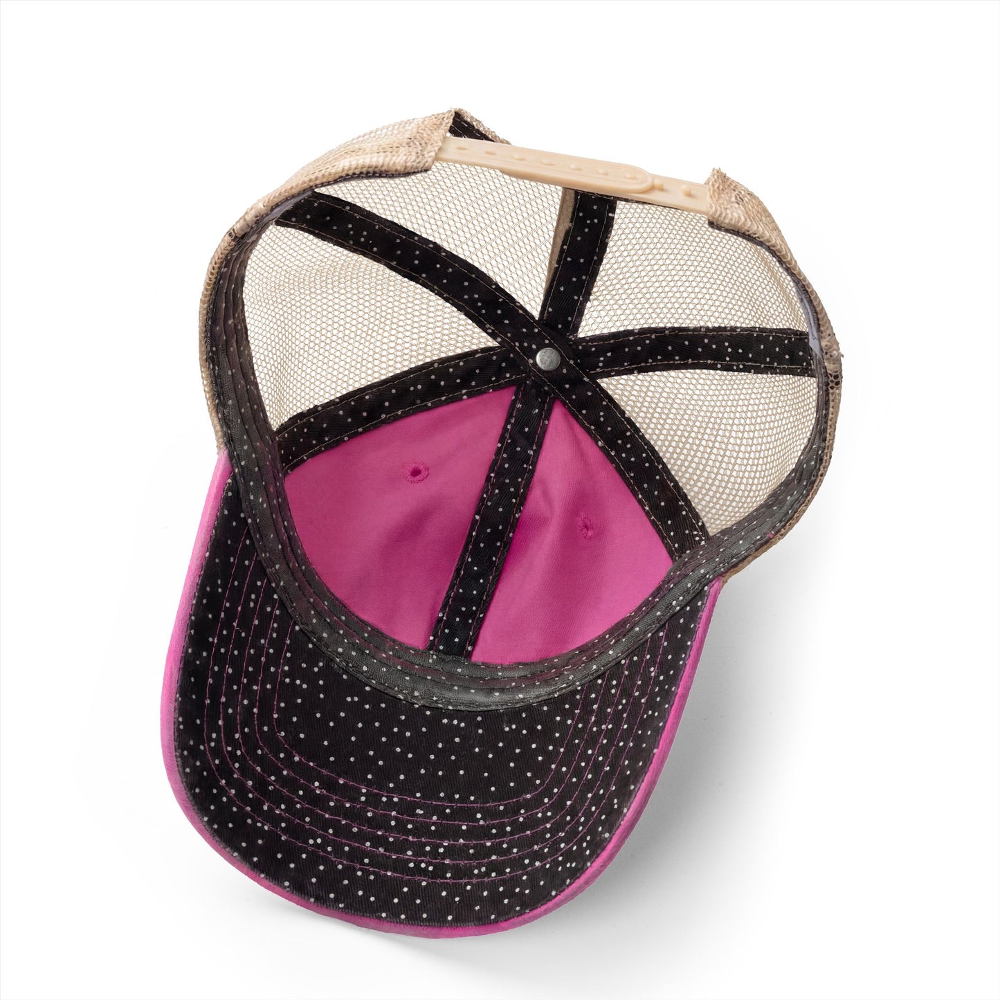 Underside of hot pink mesh trucker hat.