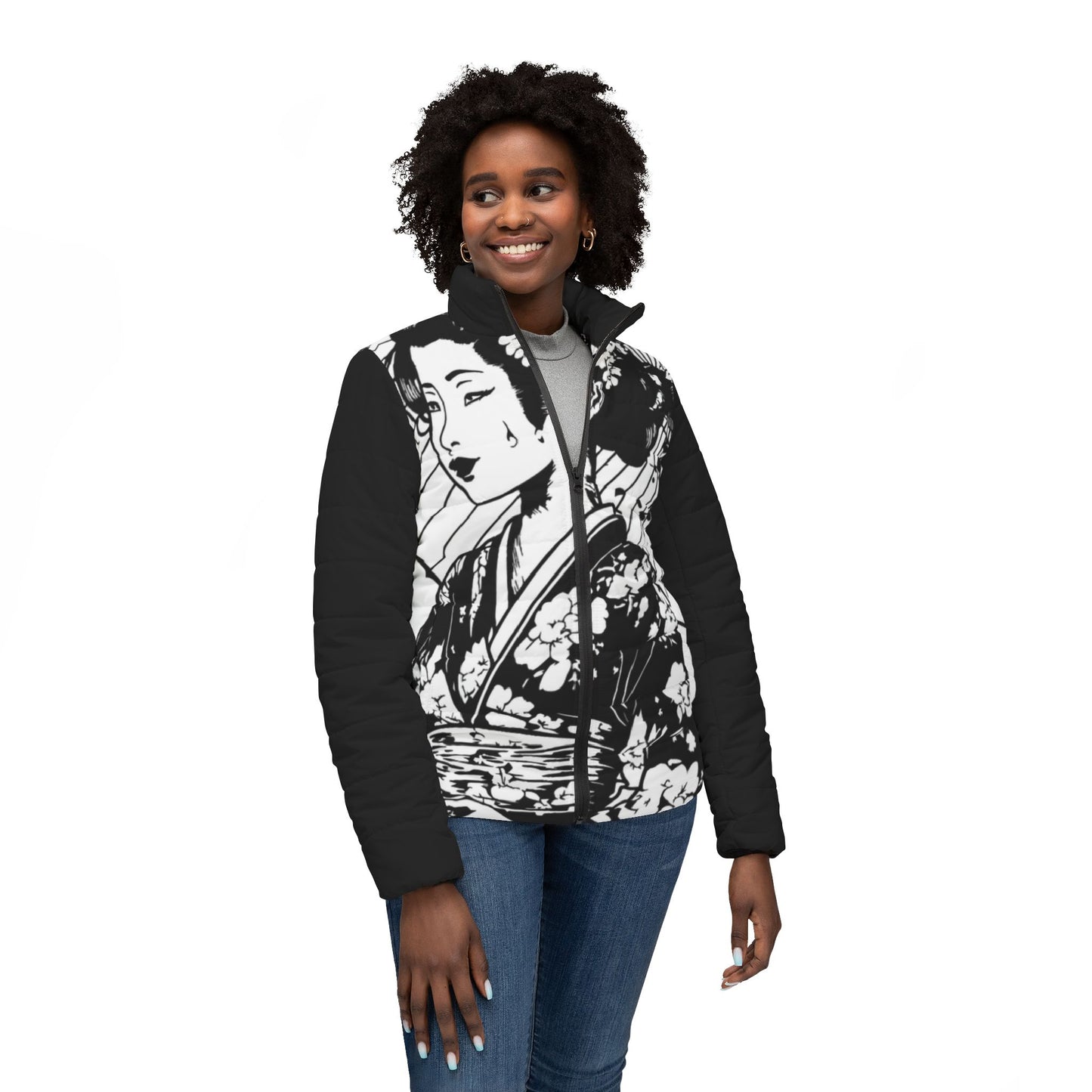 Woman wearing a black and white Japanese art jacket from the back on an autumn city street.